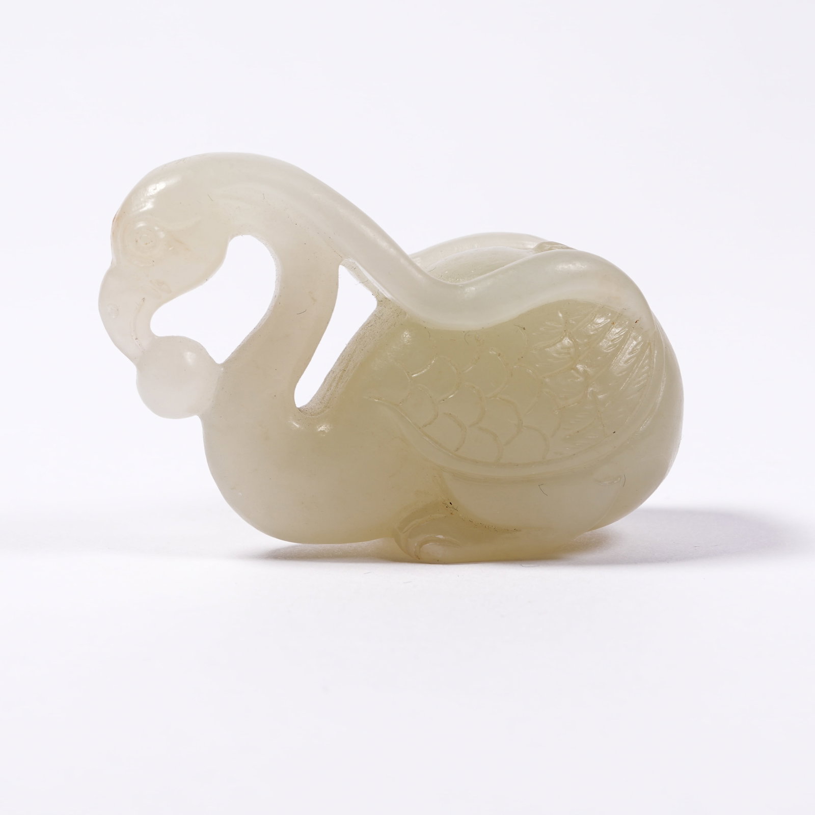 A HETIAN JADE ORNAMENT OF GOOSE PRESENTING LONGEVITY: Hetian Jade Ornament of Goose Presenting Longevity