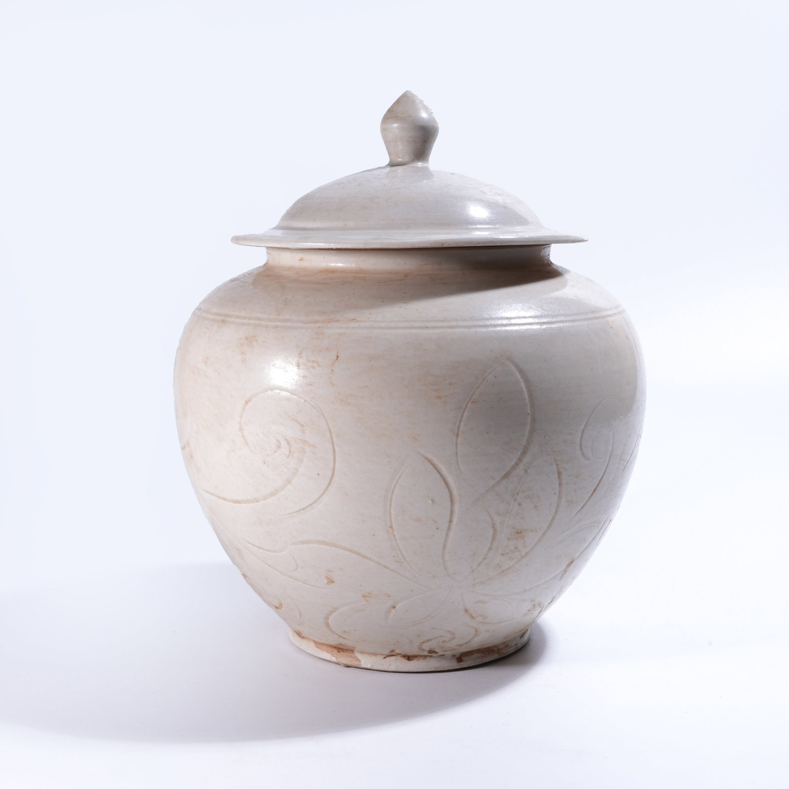 A DING KILN COVERED JAR WITH INCISED FLORAL DESIGN (1 of 8)