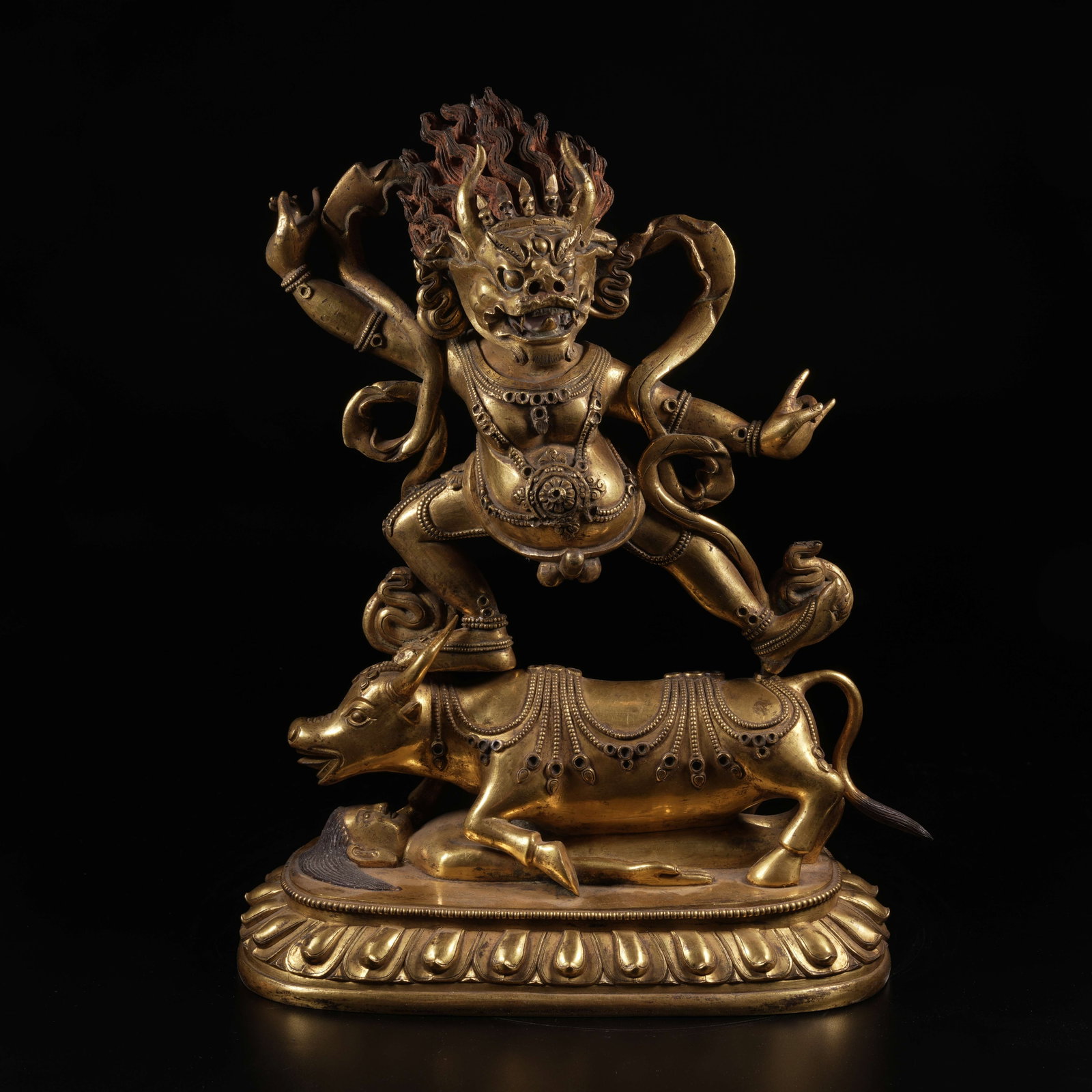 A GILT-BRONZE YAMA DHARMAPALA STATUE: Gilt-Bronze Yama Dharmapala Statue