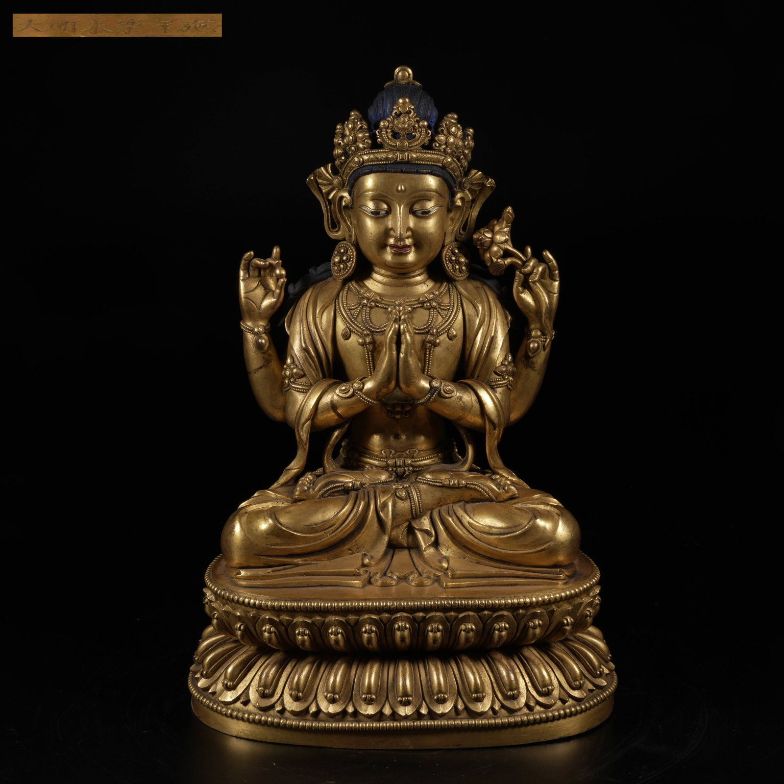 A GILT-BRONZE FOUR-ARMED AVALOKITESHVARA STATUE: Gilt-Bronze Four-Armed Avalokiteshvara Statue