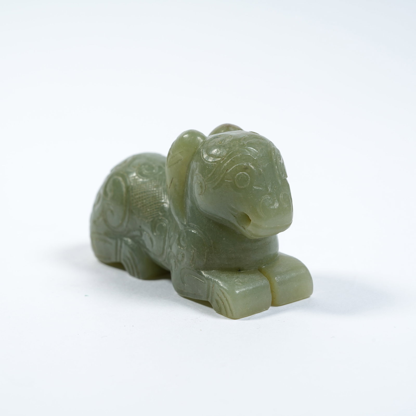 A ANCIENT JADE RECUMBENT SHEEP ORNAMENT (1 of 8)