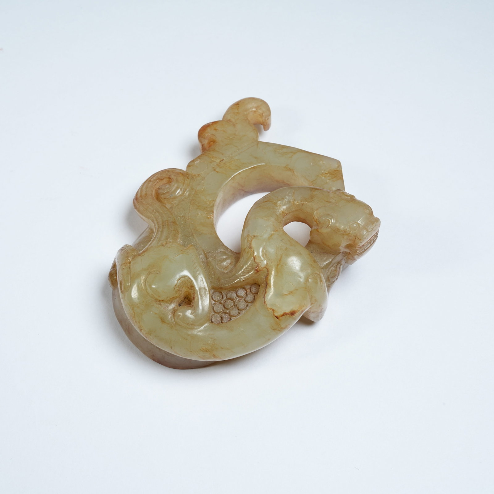 A ANCIENT JADE HEART-SHAPED PENDANT WITH CHI DRAGON PATTERNS: Ancient Jade Heart-shaped Pendant with Chi Dragon Patterns