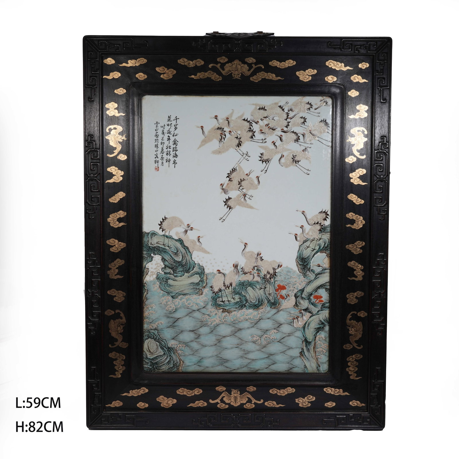 A RED SANDALWOOD HANGING SCREEN INLAID WITH FAMILLE ROSE CRANE PATTERNS: Red Sandalwood Hanging Screen Inlaid with Famille Rose Crane Patterns