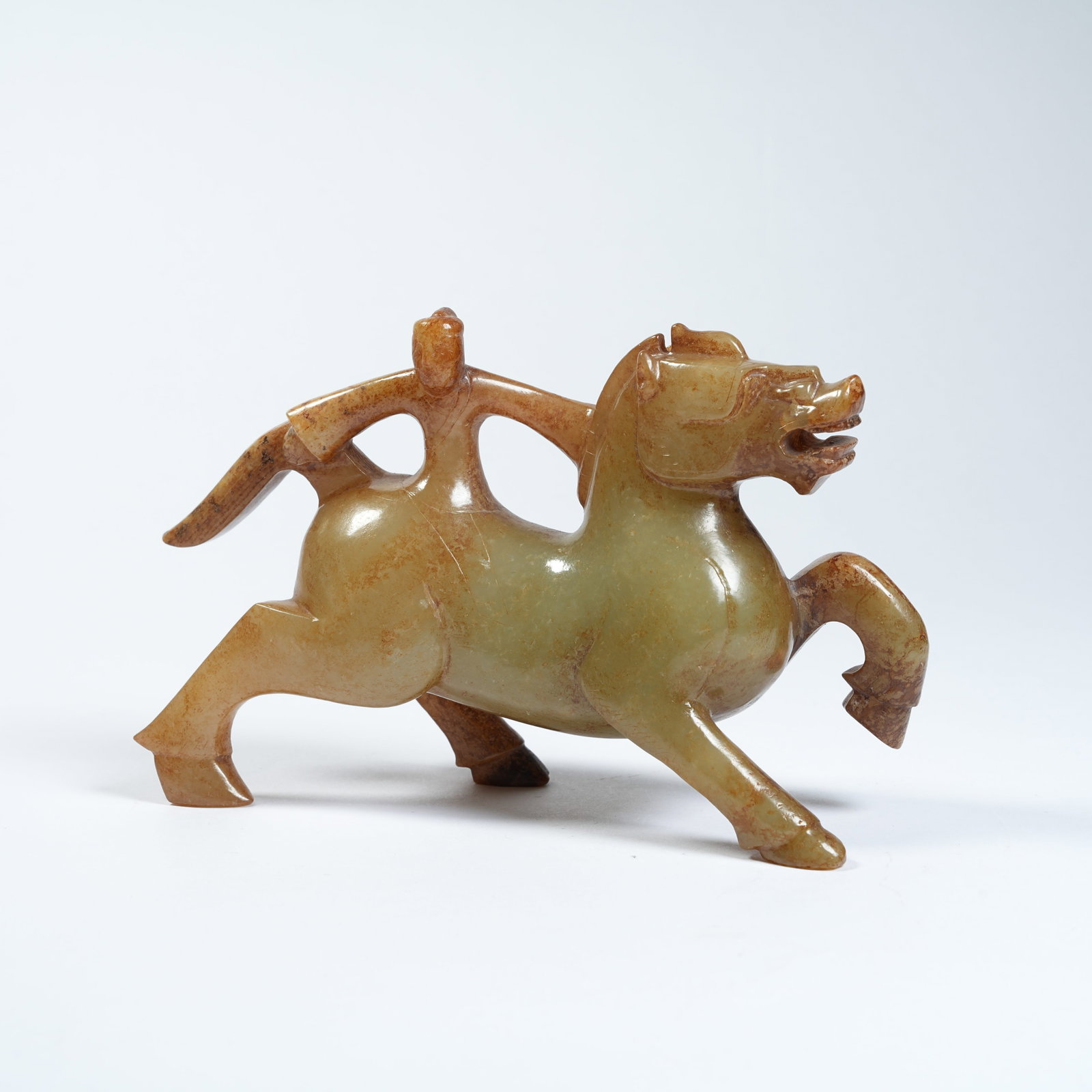 A ANCIENT JADE FIGURE-ON-HORSE ORNAMENT: Ancient Jade Figure-on-Horse Ornament