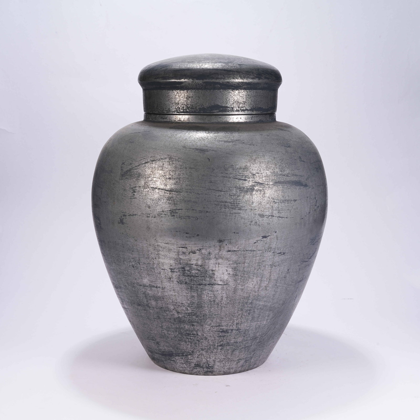 A LARGE LIDDED TIN JAR (1 of 9)