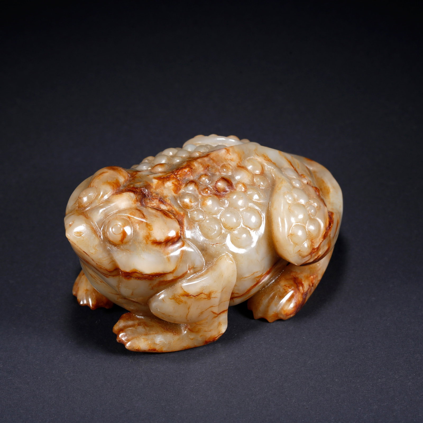 A FROG-SHAPED CARVED HETIAN JADE ORNAMENT: Frog-shaped Carved Hetian Jade Ornament