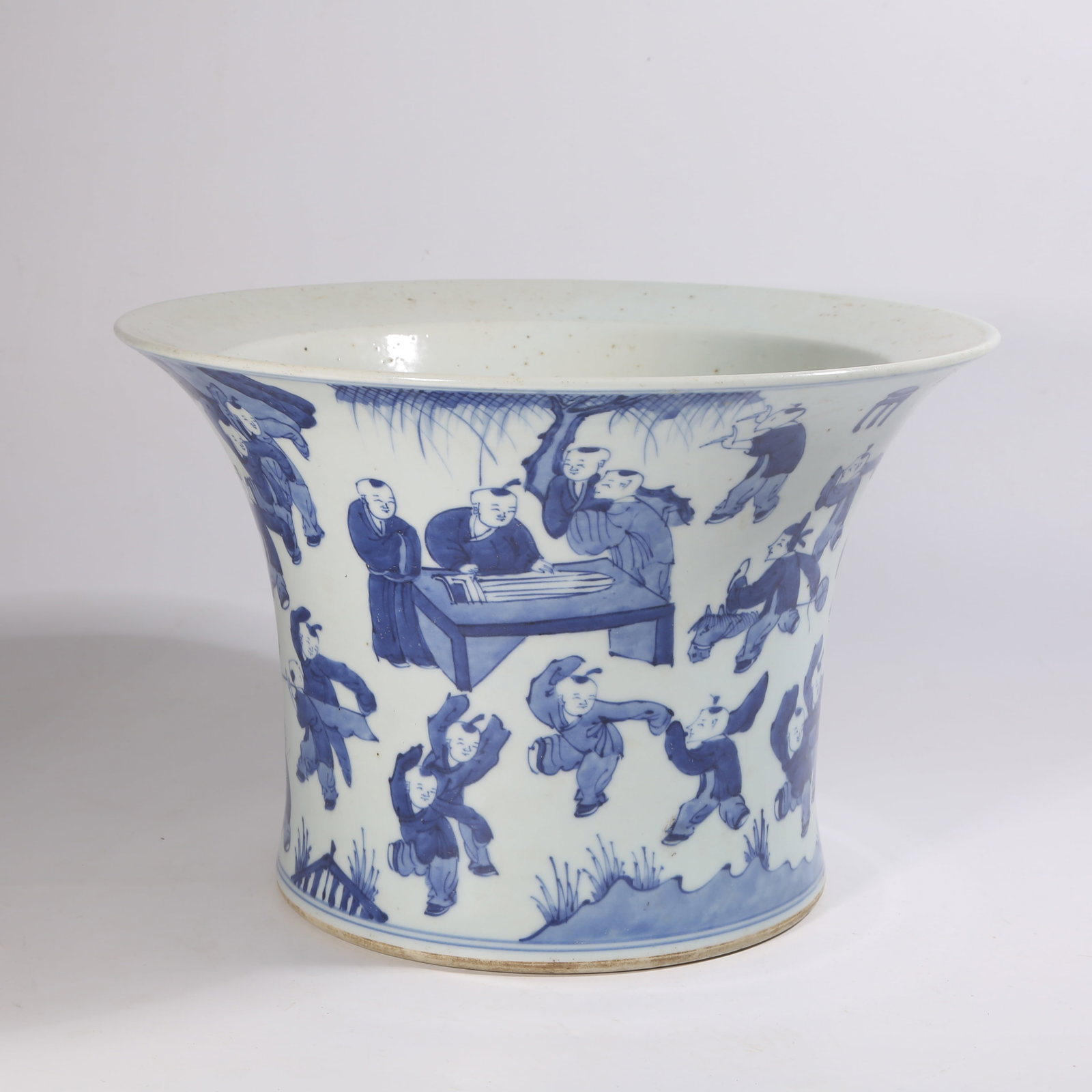 A BLUE-AND-WHITE FLOWERPOT WITH "ONE HUNDRED CHILDREN PLAYING" DESIGN: Blue-and-White Flowerpot with "One Hundred Children Playing" Design