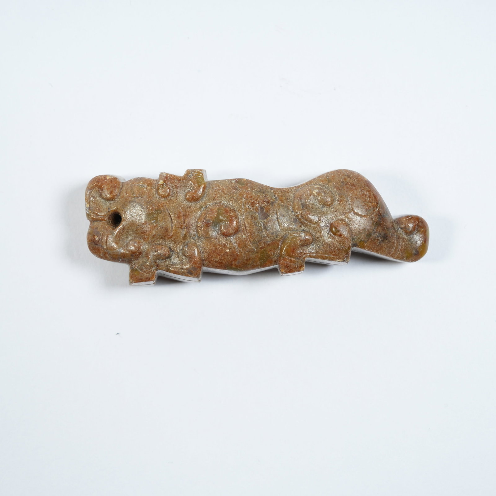 A ANCIENT JADE PENDANT WITH TIGER PATTERNS: Ancient Jade Pendant with Tiger Patterns