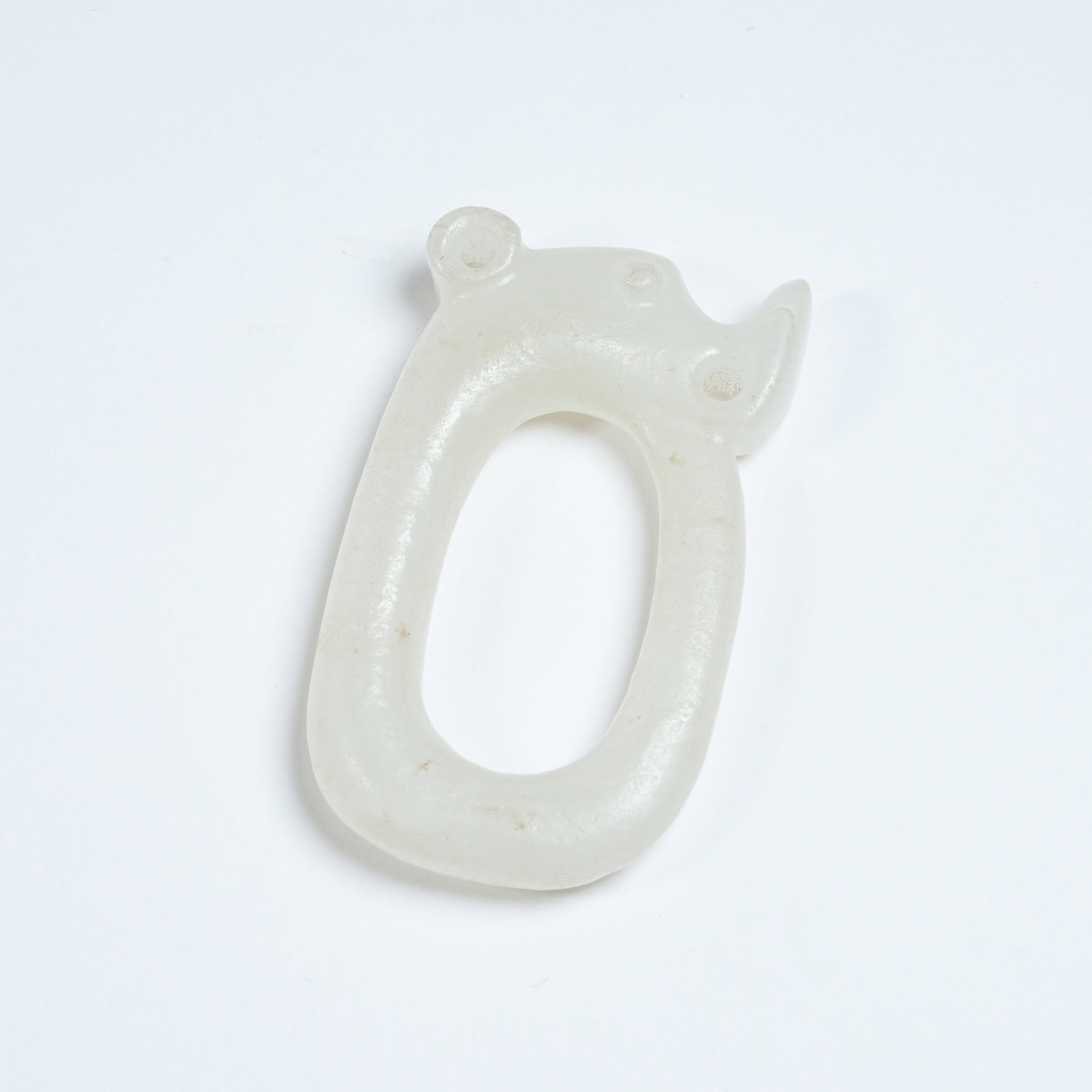 A HETIAN JADE OUROBOROS DRAGON PENDANT: Hetian Jade Ouroboros Dragon Pendant