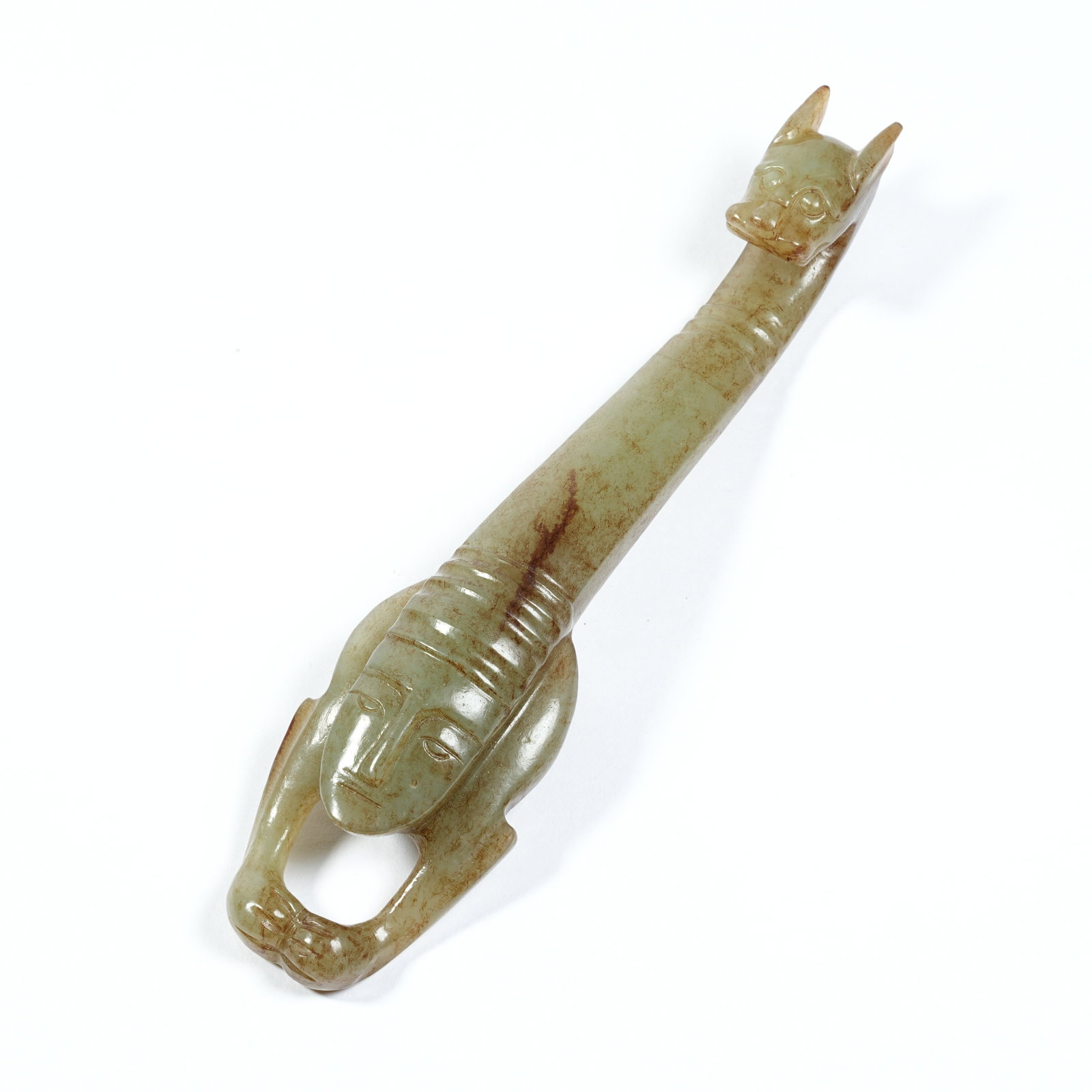 A ANCIENT JADE BELT HOOK WITH DRAGON HEAD: Ancient Jade Belt Hook with Dragon Head