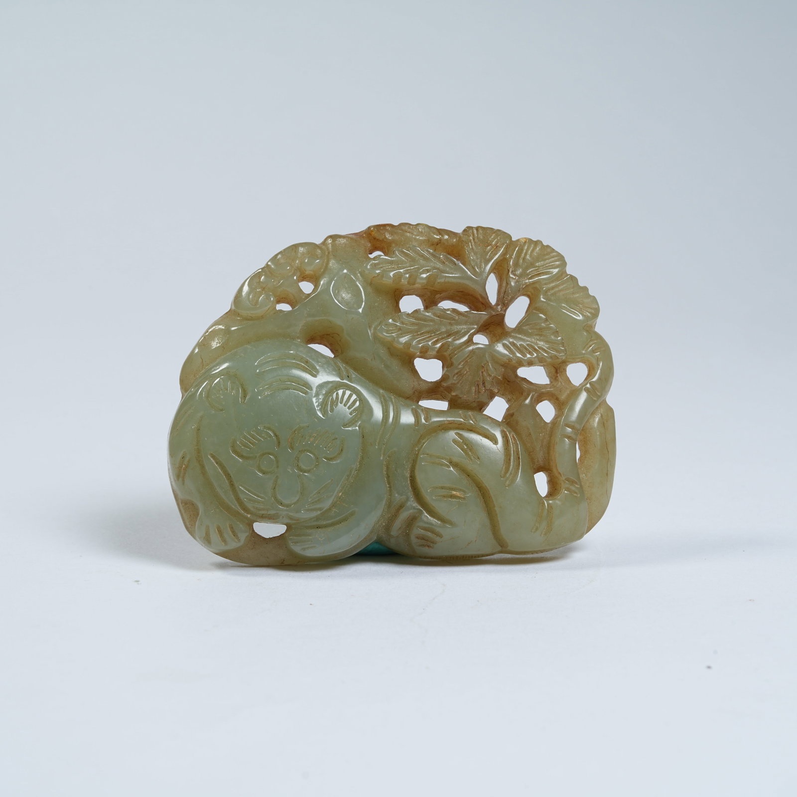 A ANCIENT JADE PENDANT WITH AUTUMN MOUNTAIN SCENE: Ancient Jade Pendant with Autumn Mountain Scene