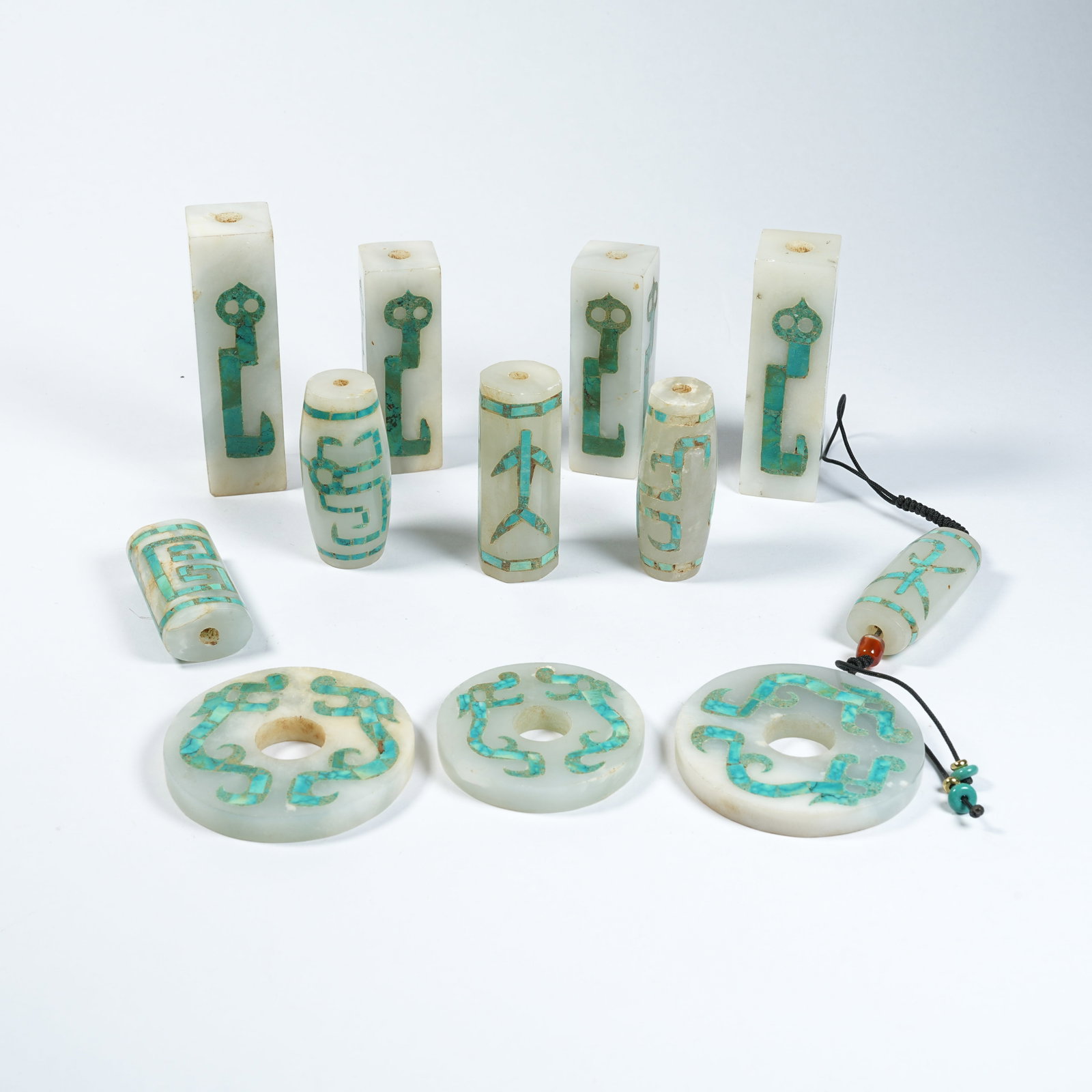 A SET OF ANCIENT JADE DRAGON PATTERN PENDANTS INLAID WITH TURQUOISE: Set of Ancient Jade Dragon Pattern Pendants Inlaid with Turquoise