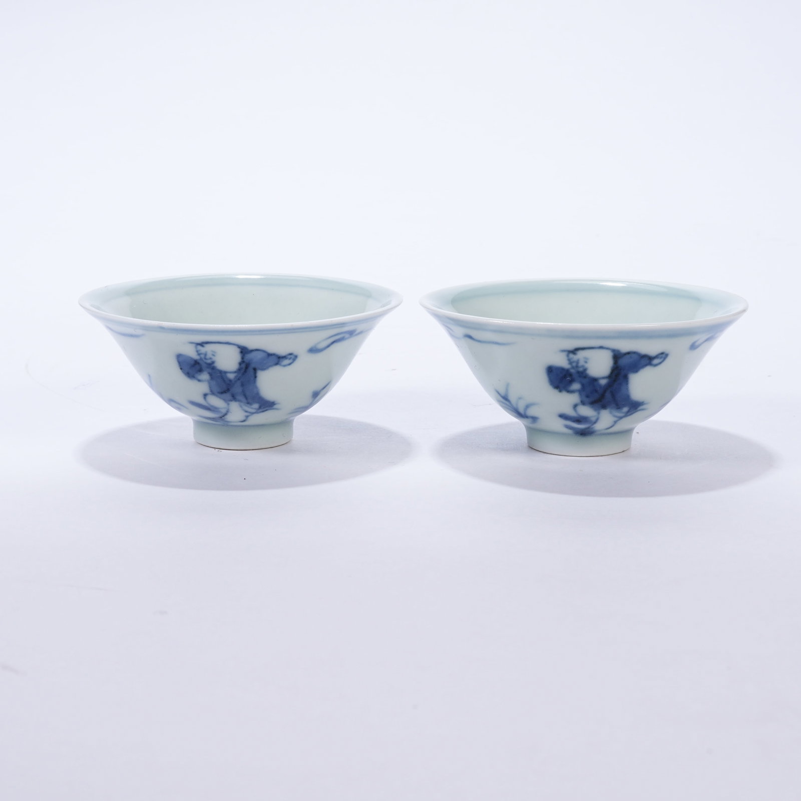 A SET OF BLUE AND WHITE WINE CUPS WITH CHILDREN AT PLAY PATTERNS (1 of 10)