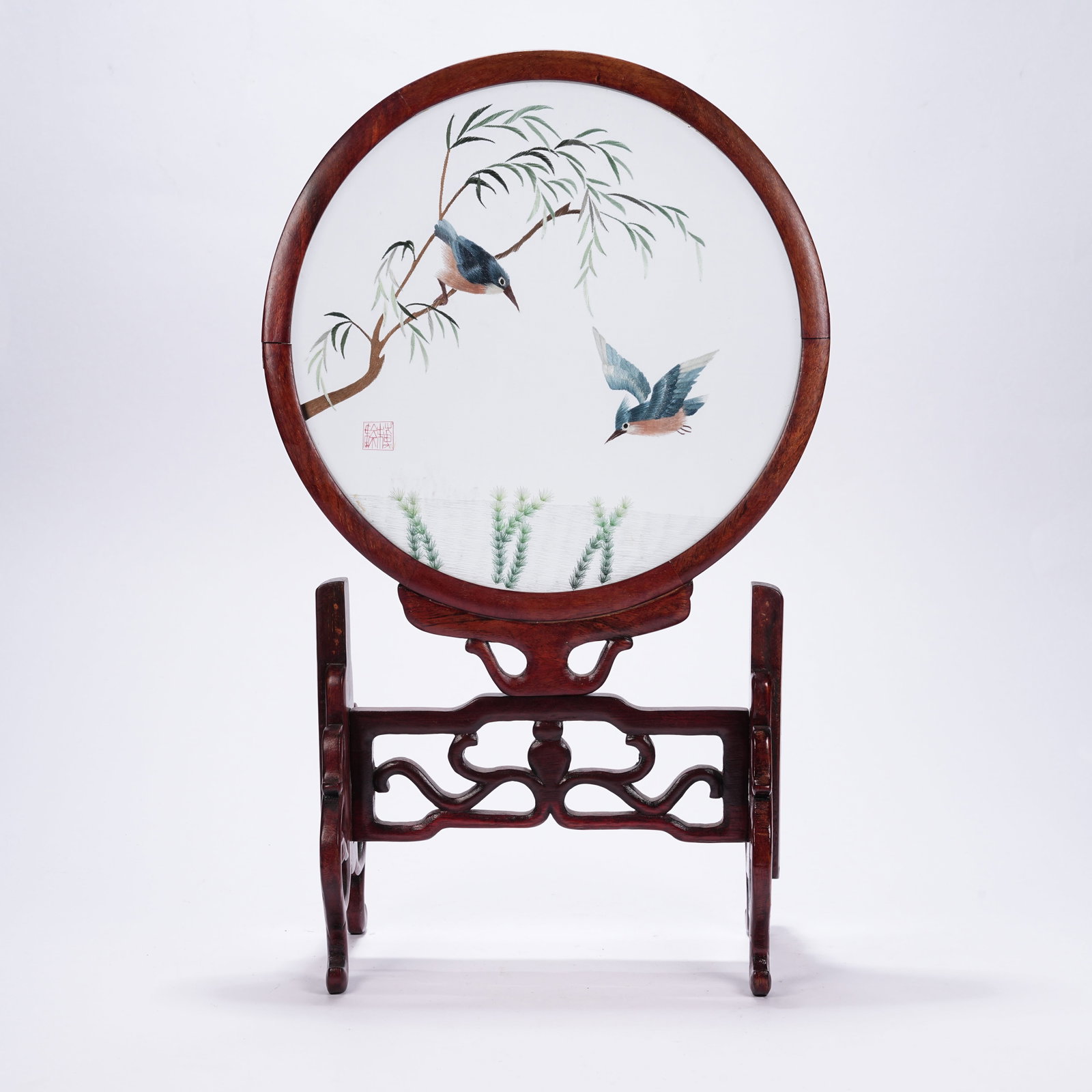 A MAHOGANY TABLE SCREEN INLAID WITH EMBROIDERED FLOWER AND BIRD DESIGNS: Mahogany Table Screen Inlaid with Embroidered Flower and Bird Designs