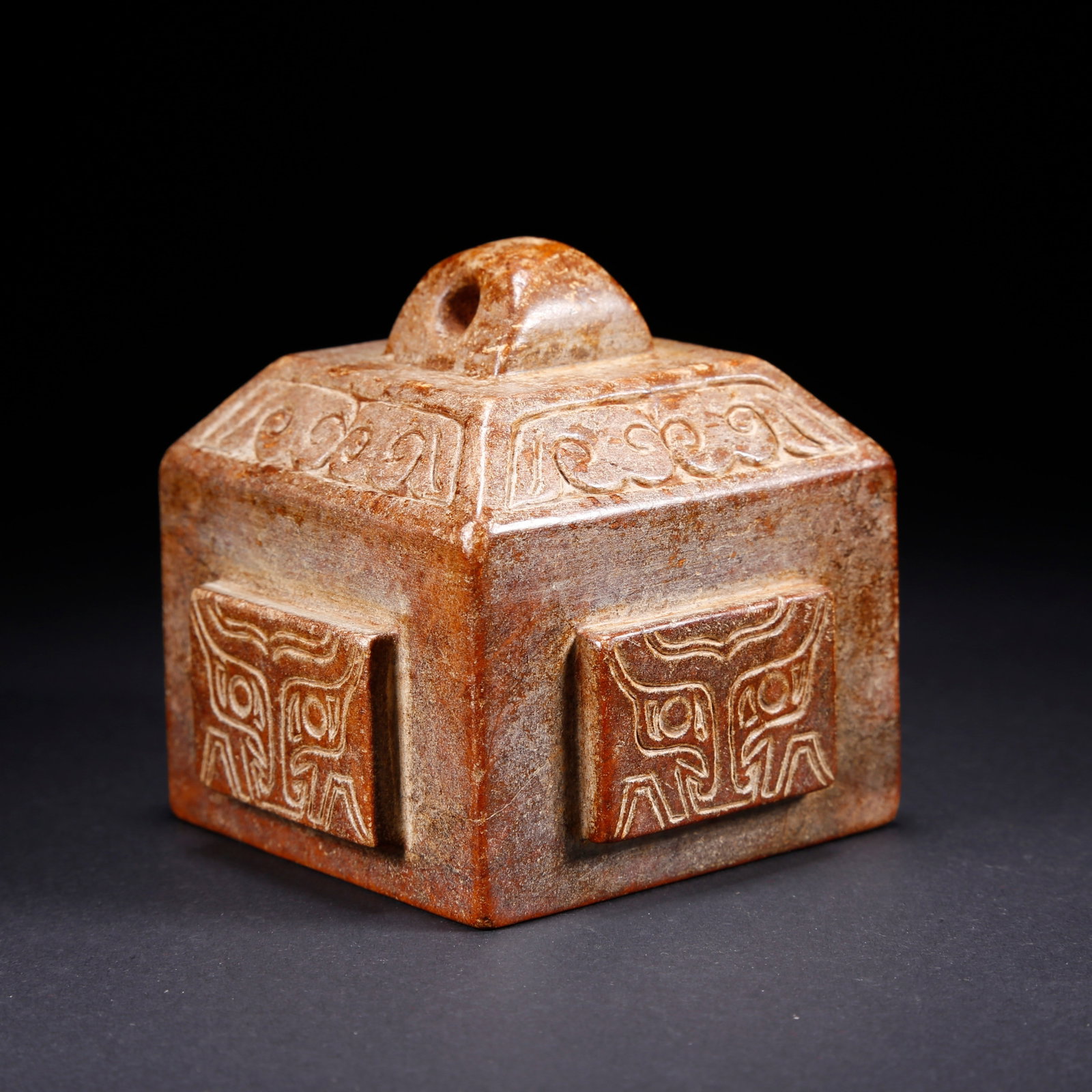 A TAOTIE PATTERN CARVED ANCIENT JADE SEAL: Taotie Pattern Carved Ancient Jade Seal