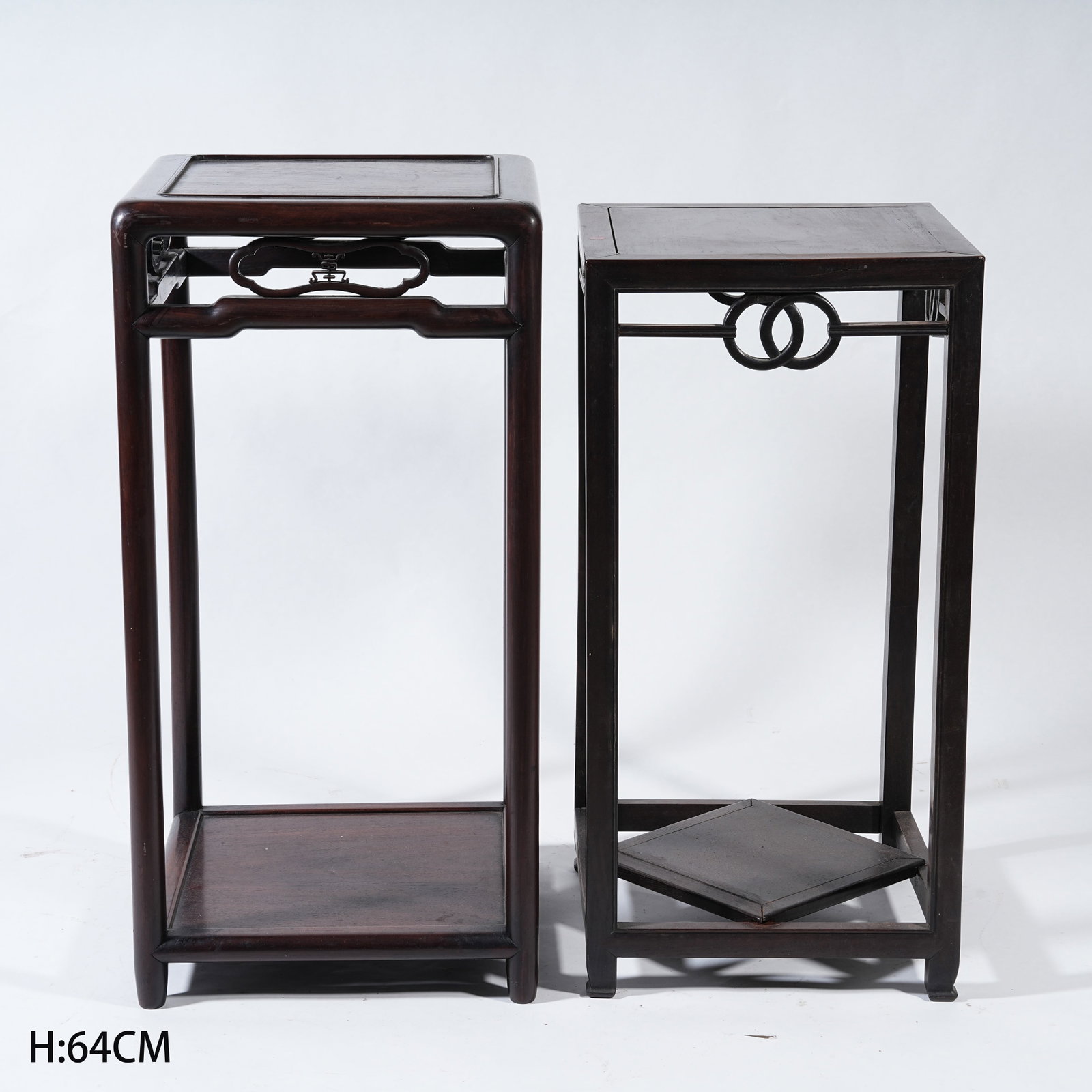 A SET OF TWO HUANGHUALI WOOD STANDS (1 of 15)