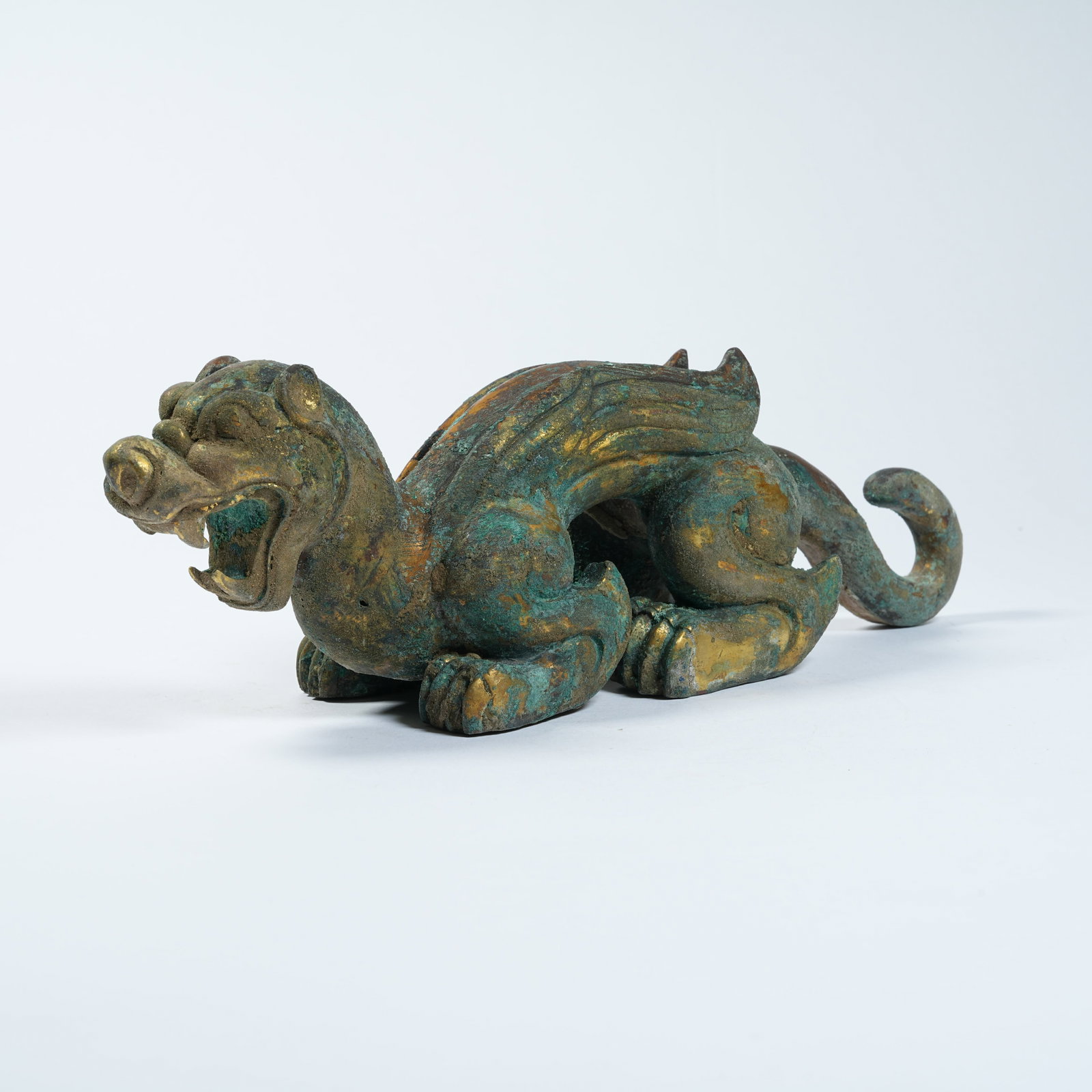 A BRONZE FLYING TIGER ORNAMENT: Bronze Flying Tiger Ornament
