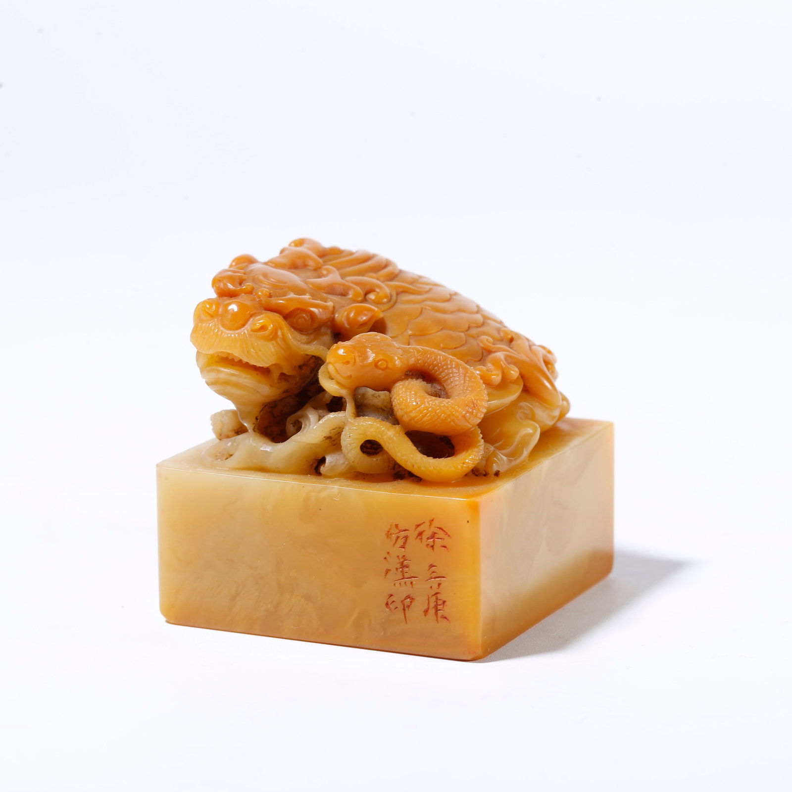 A SHOUSHAN TIANHUANG STONE SEAL WITH BEAST KNOB: Shoushan Tianhuang Stone Seal with Beast Knob