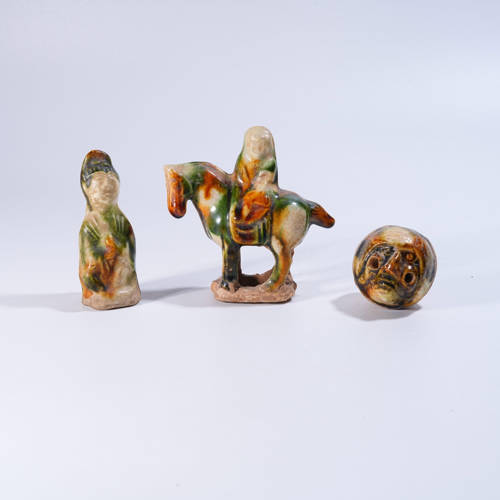 A SET OF TANG SANCAI FIGURINES (1 of 8)