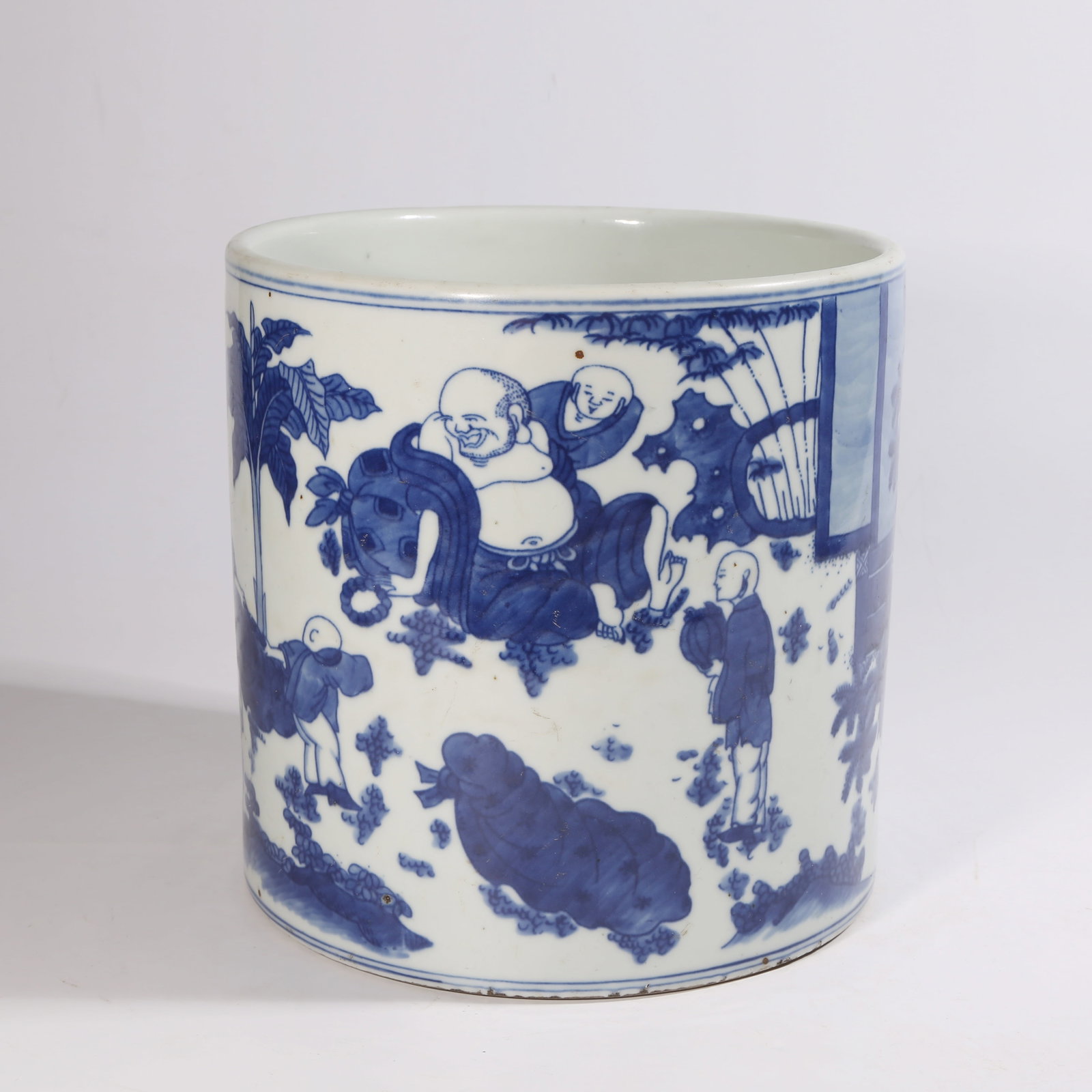 A BLUE-AND-WHITE BRUSH HOLDER WITH CHILDREN PLAYING WITH MAITREYA DESIGN (1 of 9)