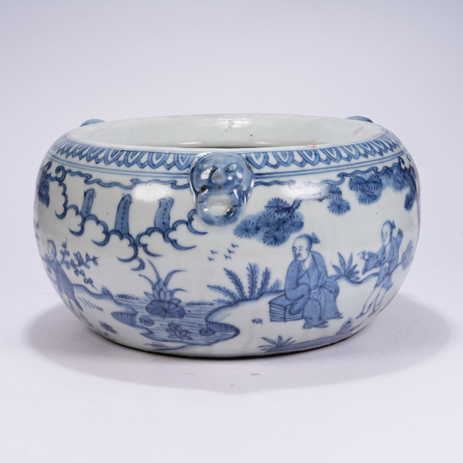 A BLUE AND WHITE TABLE CENSER WITH FIGURE STORIES AND BEAST HEAD HANDLES: Blue and White Table Censer with Figure Stories and Beast Head Handles