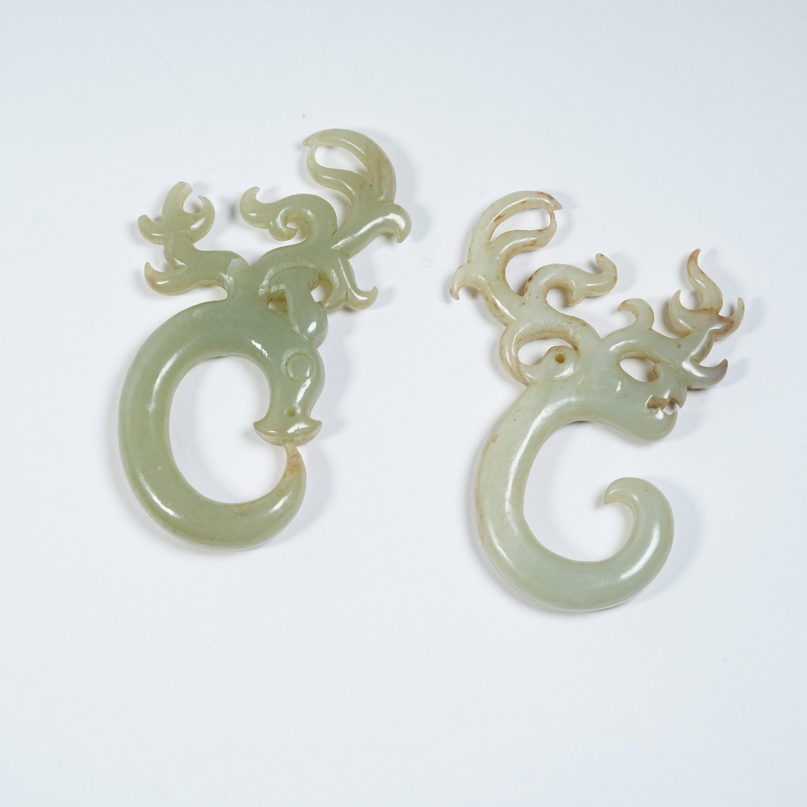 A SET OF ANCIENT JADE C-SHAPED DEER ORNAMENTS (1 of 10)