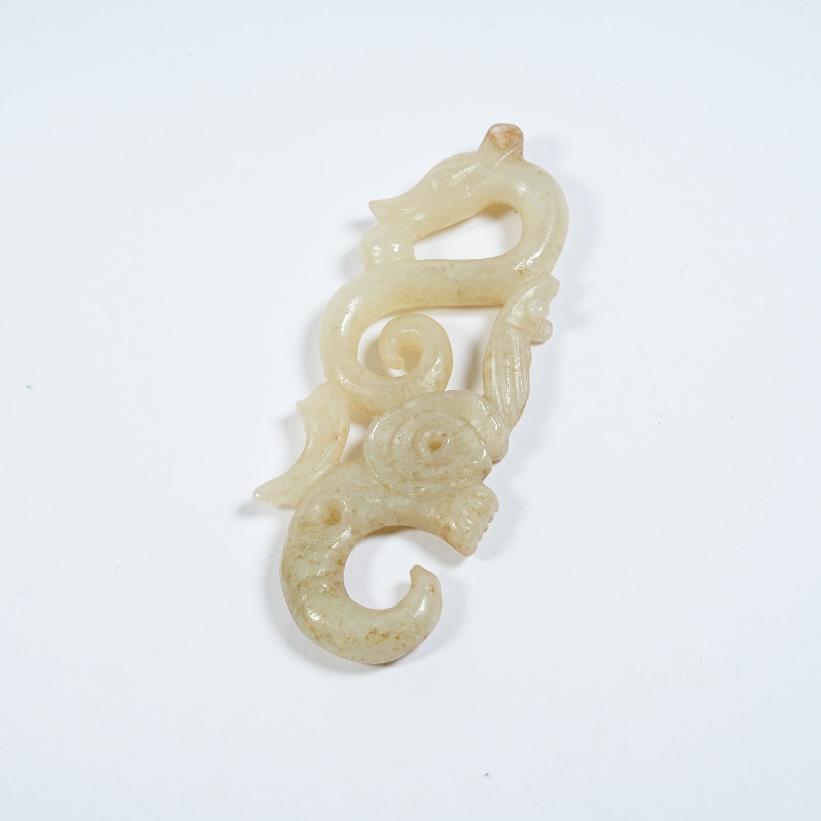 A ANCIENT JADE PENDANT WITH S-SHAPED AND C-SHAPED DRAGONS: Ancient Jade Pendant with S-shaped and C-shaped Dragons
