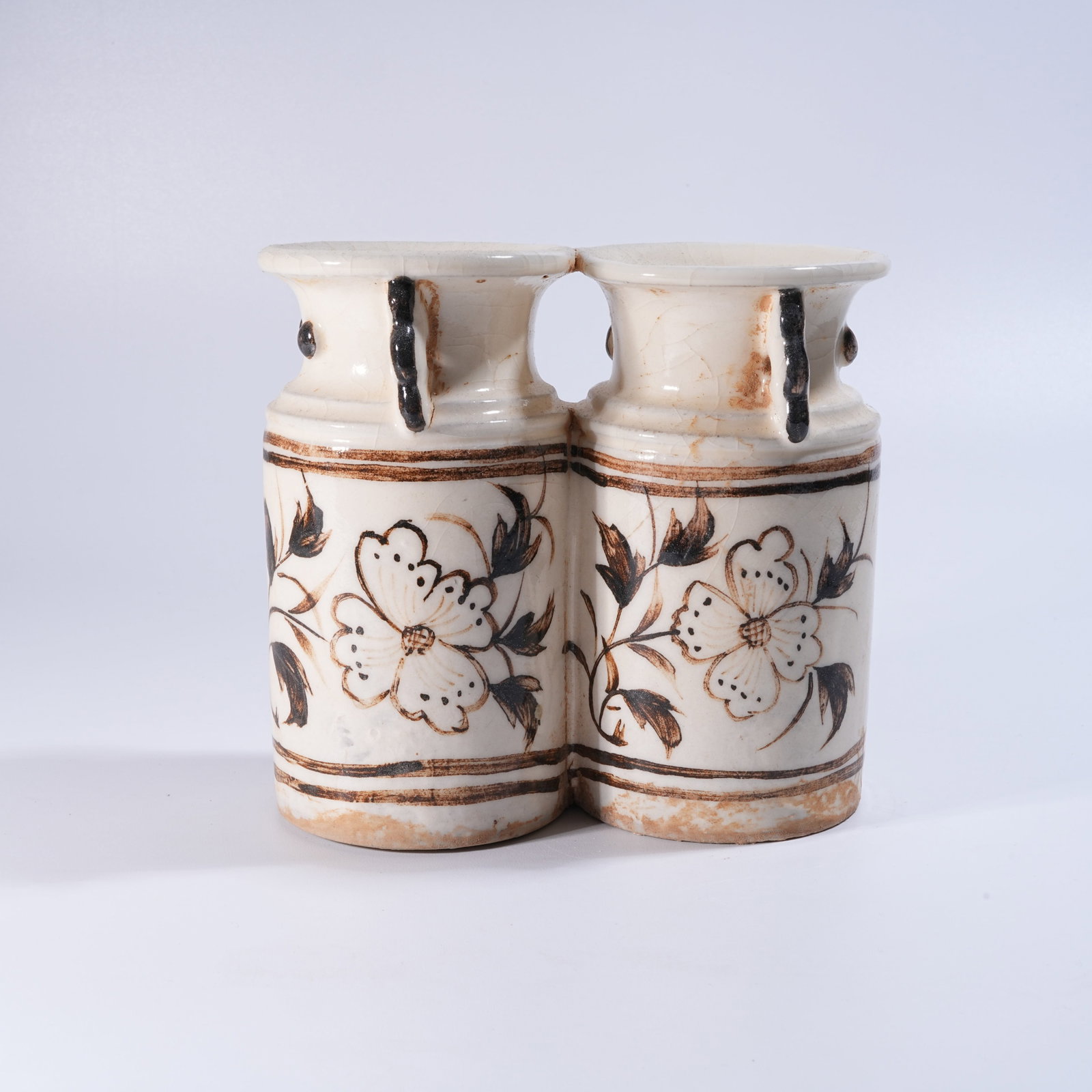 A WHITE-GLAZED INCISED TWIN-LINKED BOTTLE: White-Glazed Incised Twin-Linked Bottle