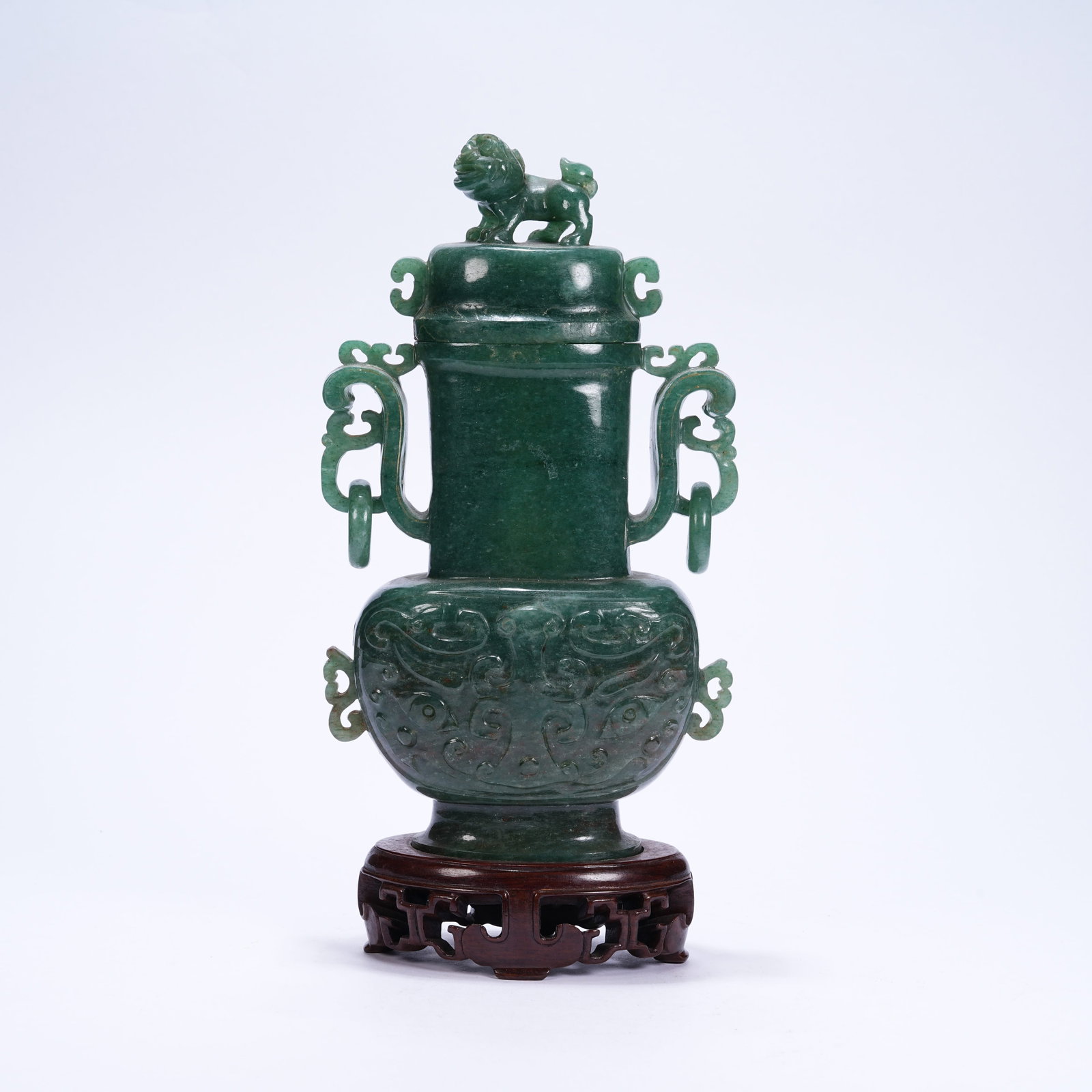 A HETIAN JASPER LIDDED VASE WITH BEAST MASK PATTERNS, MOVABLE RINGS AND AUSPICIOUS BEAST KNOB: Hetian Jasper Lidded Vase with Beast Mask Patterns, Movable Rings and Auspicious Beast Knob