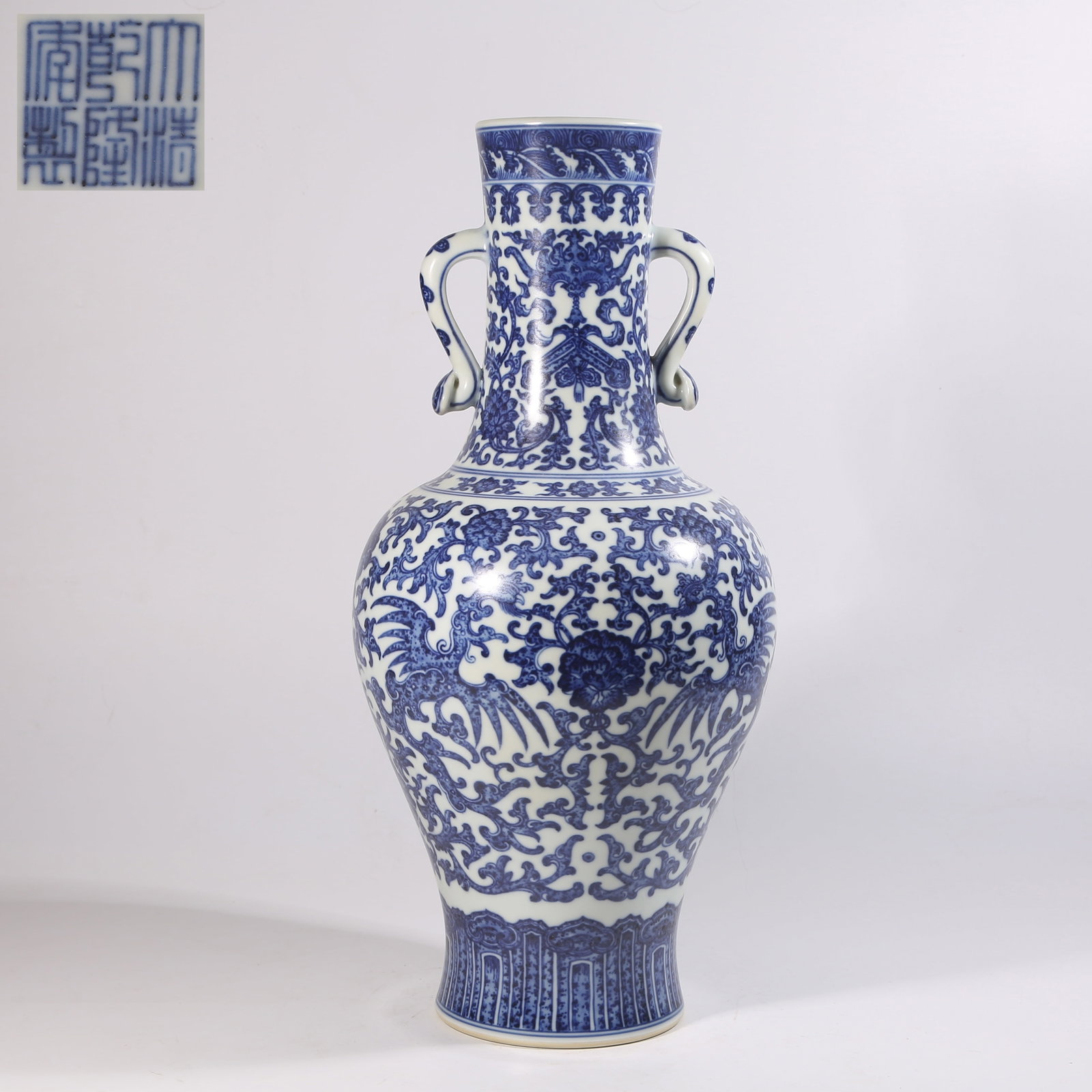 A BLUE-AND-WHITE RUYI-HANDLED VASE WITH "DRAGON AMID FLOWERS" DESIGN (1 of 9)