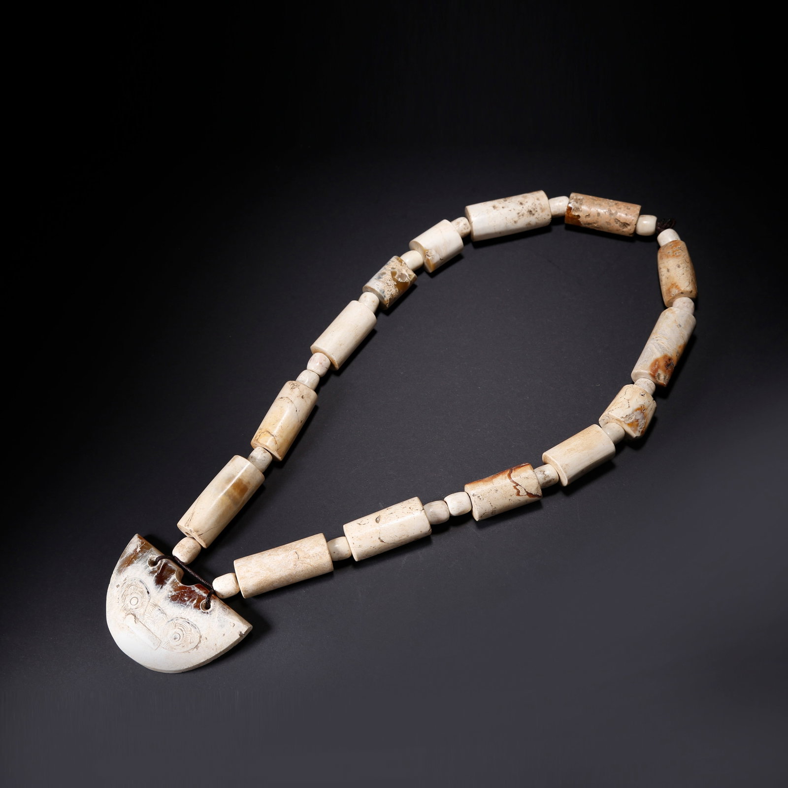 A TAOTIE PATTERN ANCIENT JADE PENDANT: Taotie Pattern Ancient Jade Pendant