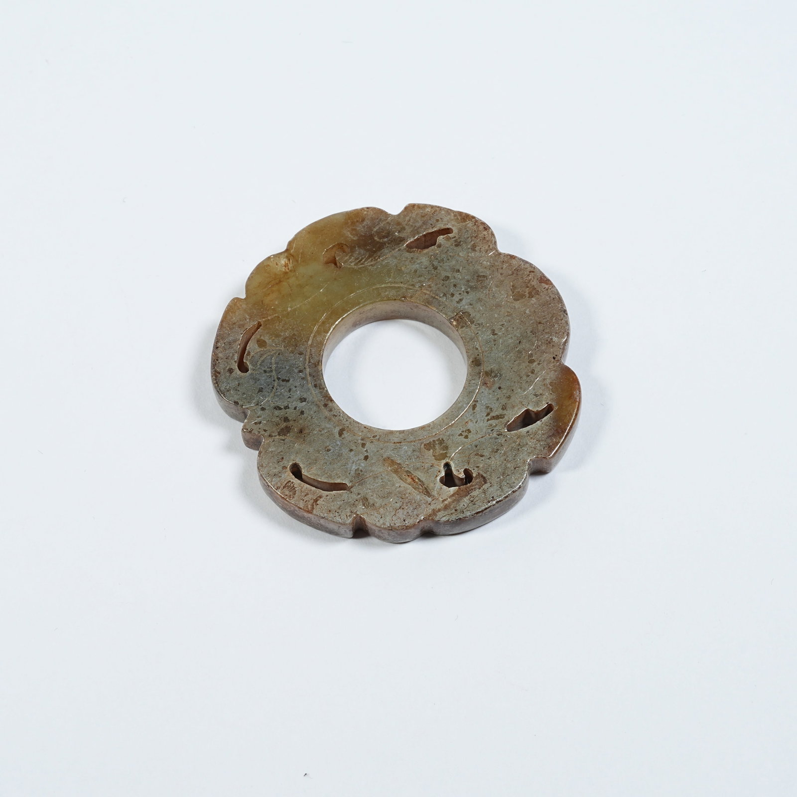 A ANCIENT JADE BI WITH DRAGON PATTERNS: Ancient Jade Bi with Dragon Patterns