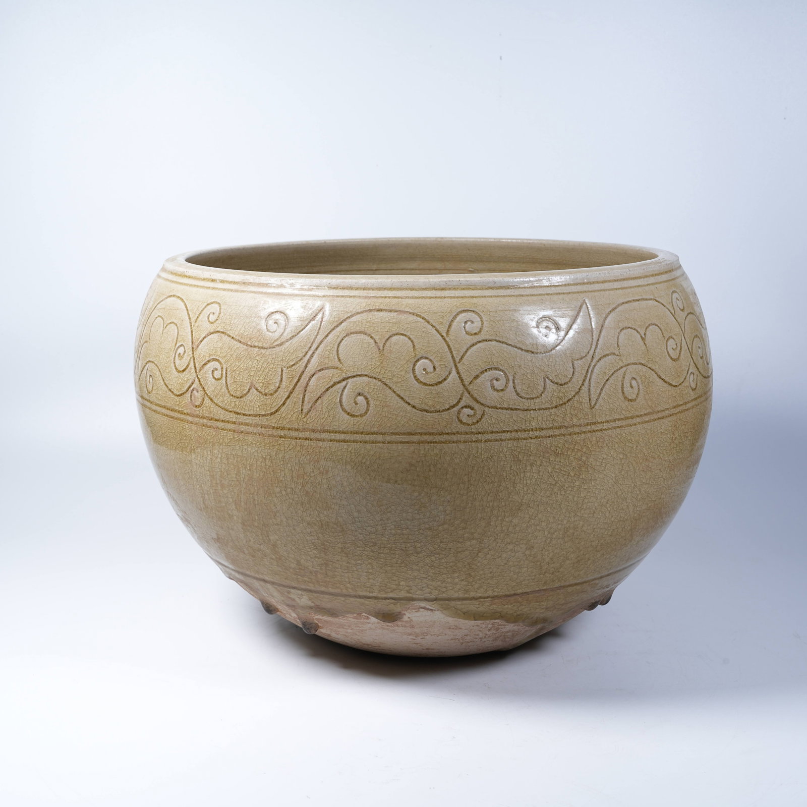A YUE KILN YELLOWISH CELADON BOWL INCISED WITH FLORAL PATTERNS (1 of 9)