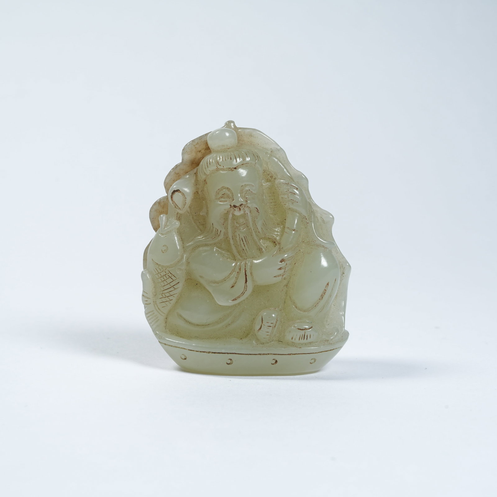A HETIAN JADE PENDANT WITH FISHERMAN'S JOY MOTIF: Hetian Jade Pendant with Fisherman's Joy Motif