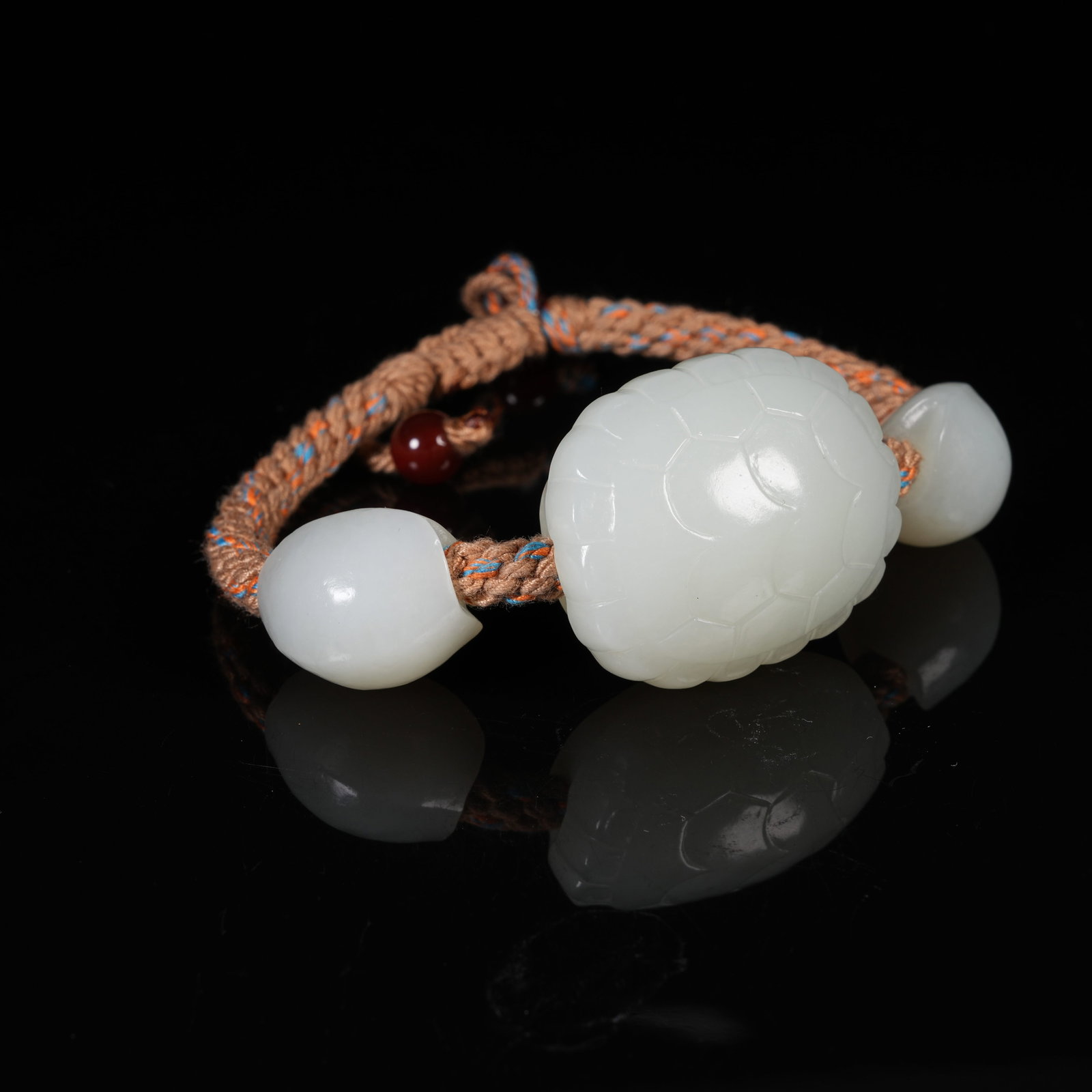 A STRING OF WHITE HETIAN JADE TURTLE SHELL BEADS (1 of 8)
