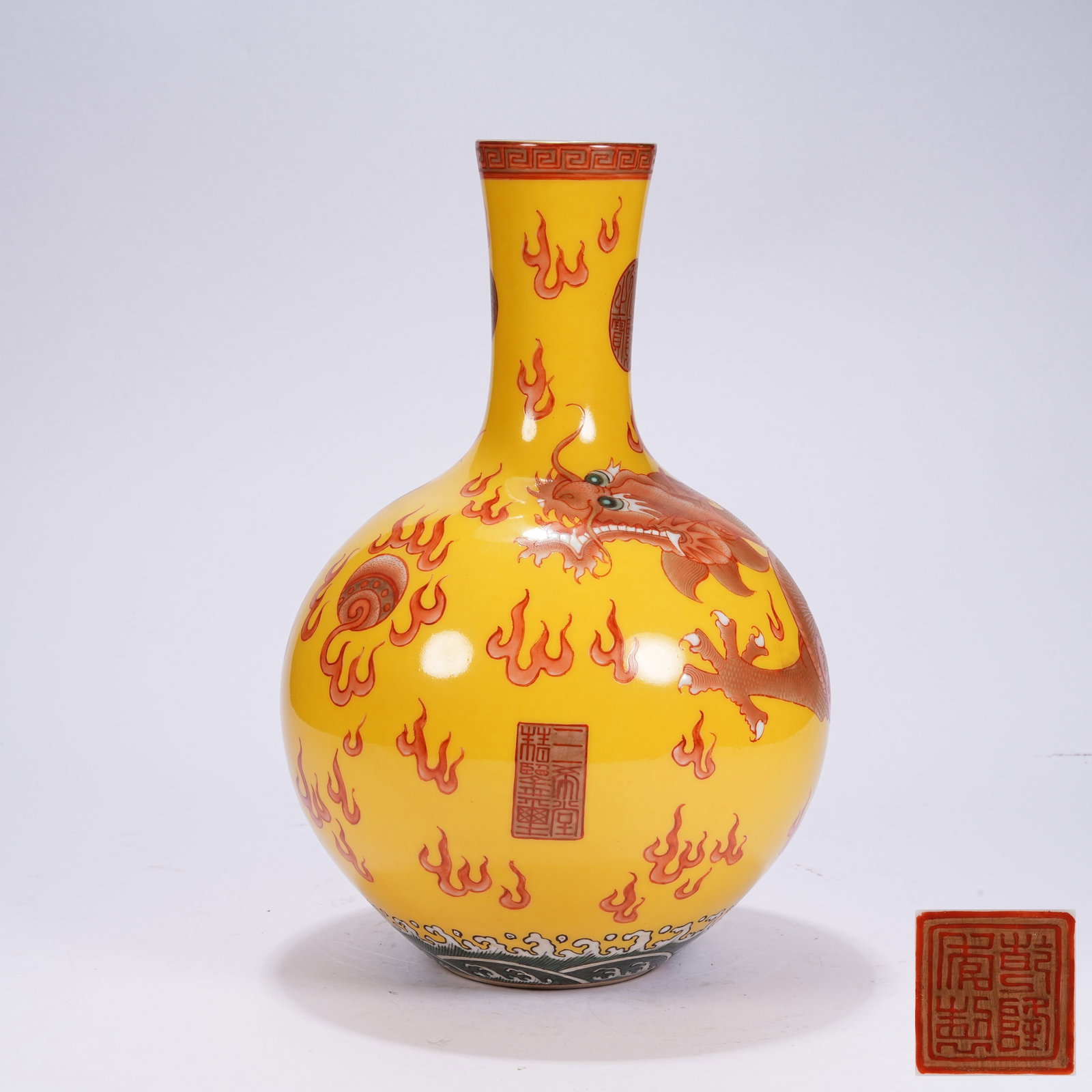 A YELLOW GROUND IRON RED DECORATIVE VASE WITH DRAGONS CHASING PEARLS (1 of 9)
