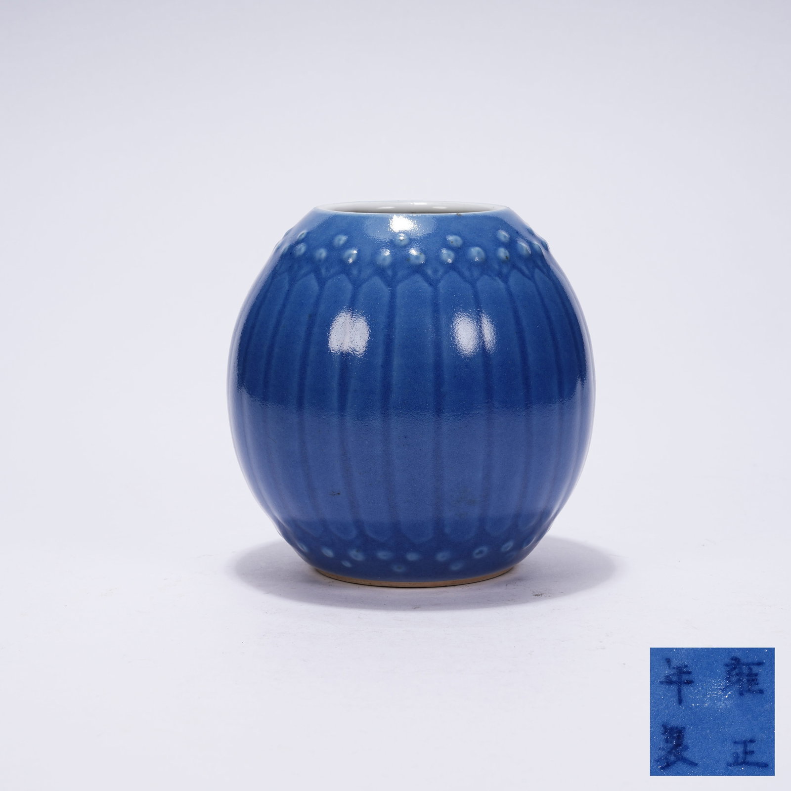 A SKY-BLUE GLAZE JAR WITH LOTUS PETAL PATTERNS: Sky-blue Glaze Jar with Lotus Petal Patterns