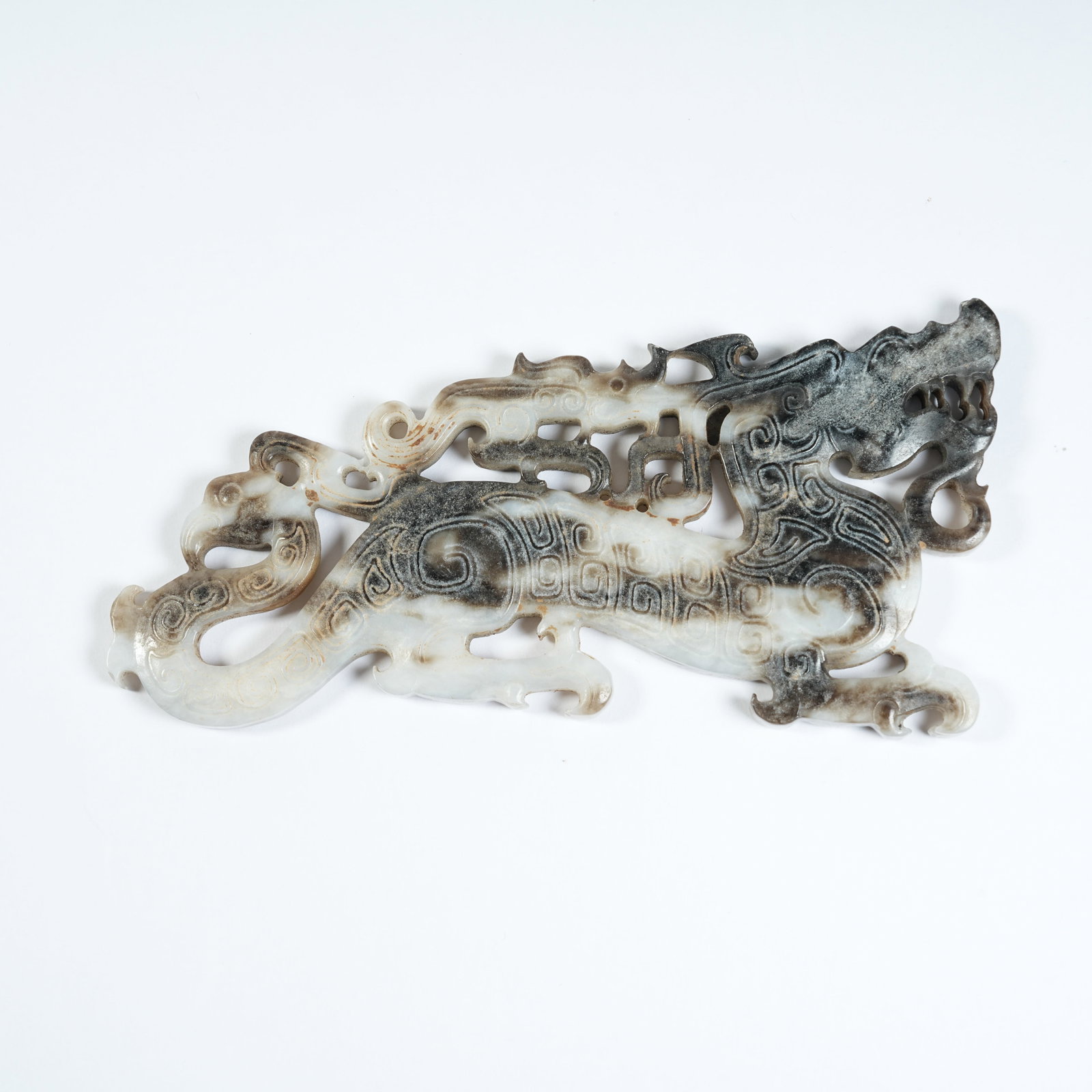 A ANCIENT JADE PENDANT WITH DRAGON PATTERNS: Ancient Jade Pendant with Dragon Patterns