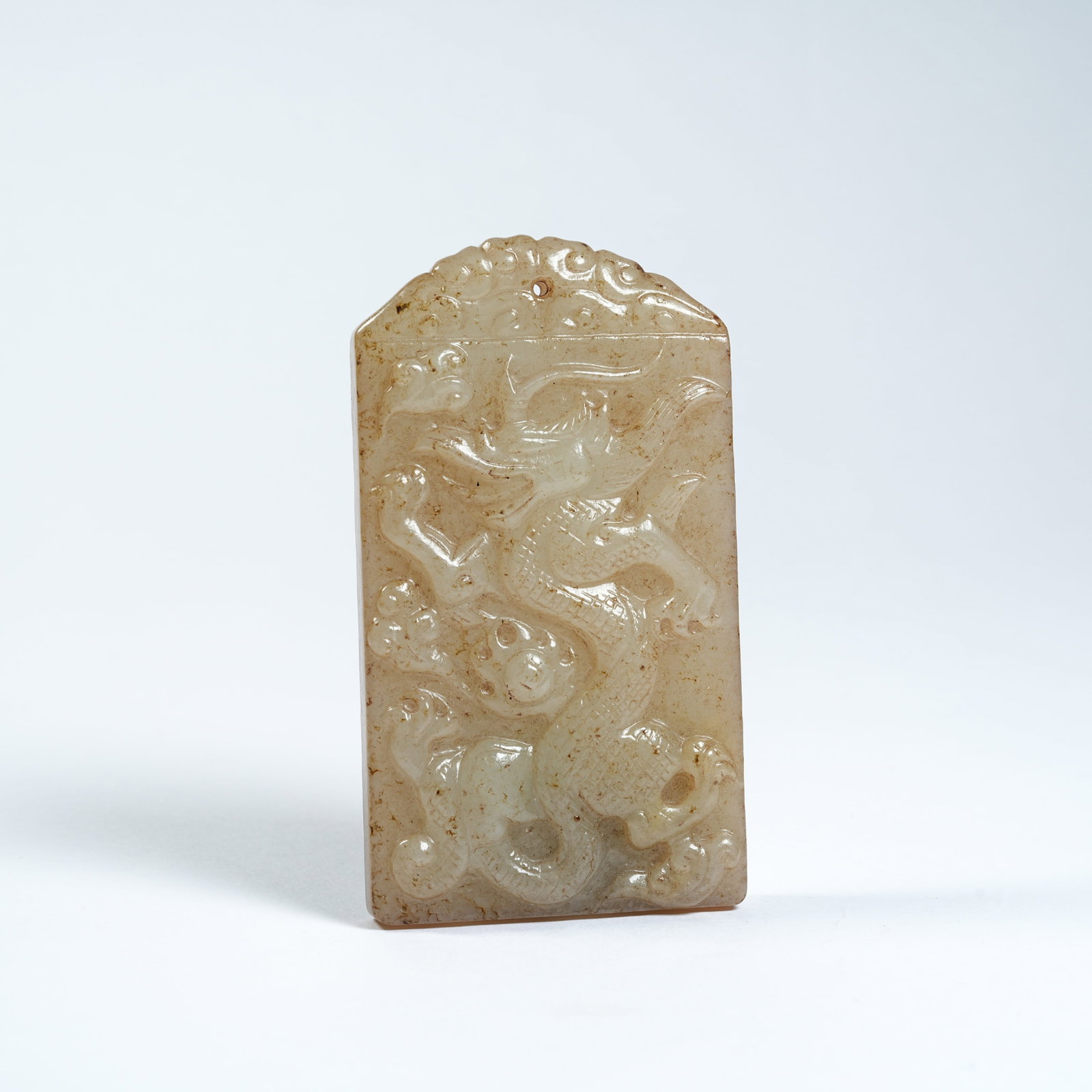 A ANCIENT JADE PLAQUE WITH DRAGON PATTERNS (1 of 8)