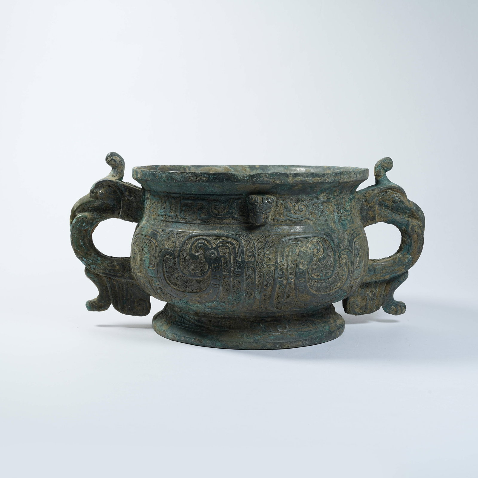A BRONZE GUI-STYLE CENSER WITH BEAST MASK PATTERNS AND PHOENIX EARS: Bronze Gui-style Censer with Beast Mask Patterns and Phoenix Ears