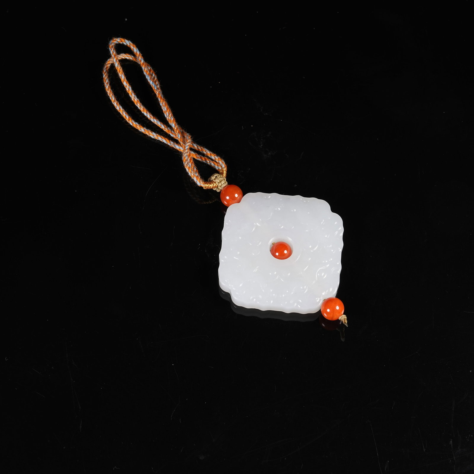 A HETIAN JADE PENDANT WITH BEAST MASK PATTERNS: Hetian Jade Pendant with Beast Mask Patterns