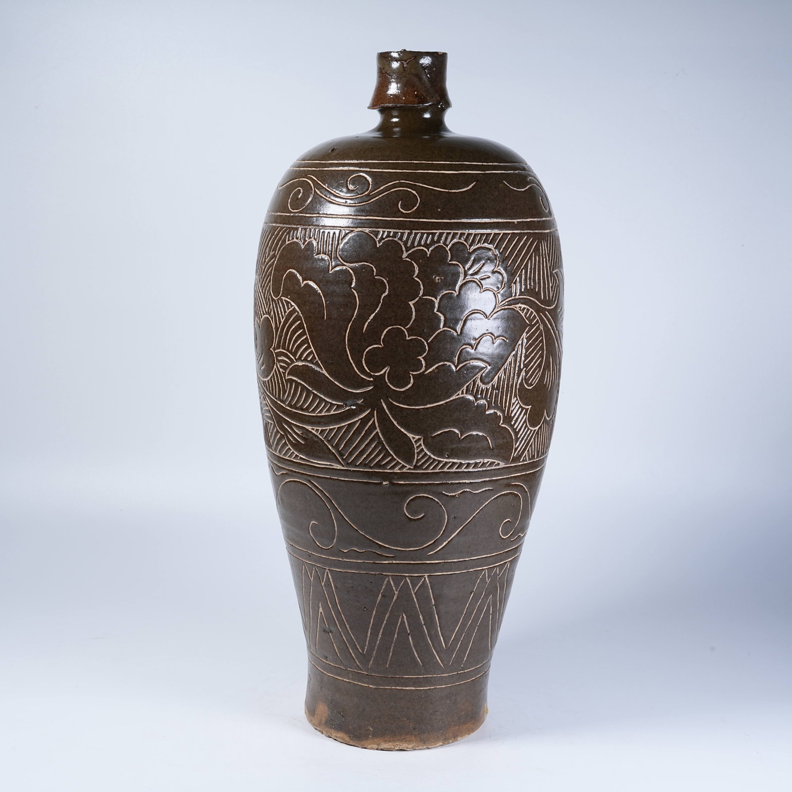 A CIZHOU KILN PRUNUS VASE WITH CARVED DECORATION: Cizhou Kiln Prunus Vase with Carved Decoration