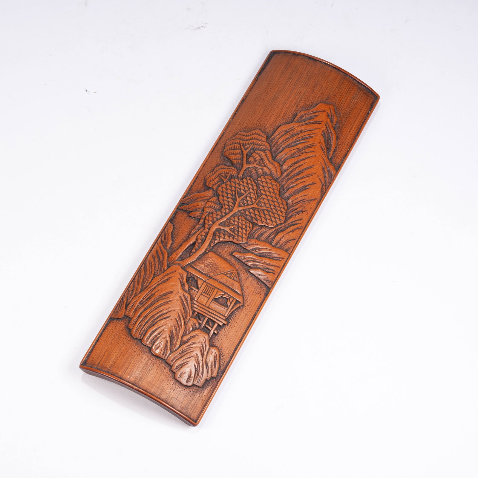 A BAMBOO CARVED ARM REST WITH LANDSCAPE AND PAVILION PATTERNS: Bamboo Carved Arm Rest with Landscape and Pavilion Patterns