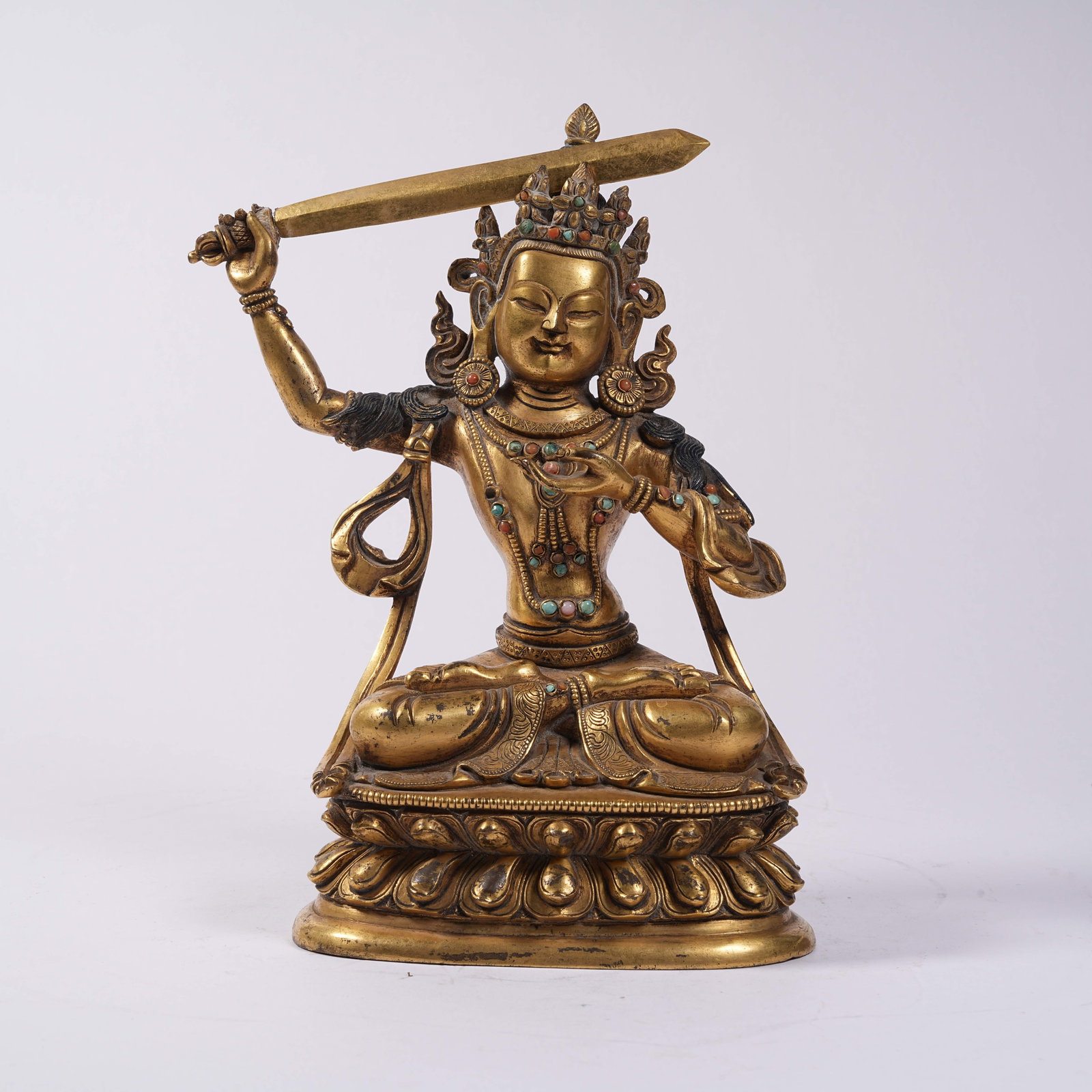 A GILT BRONZE SEATED BODHISATTVA STATUE: Gilt Bronze Seated Bodhisattva Statue