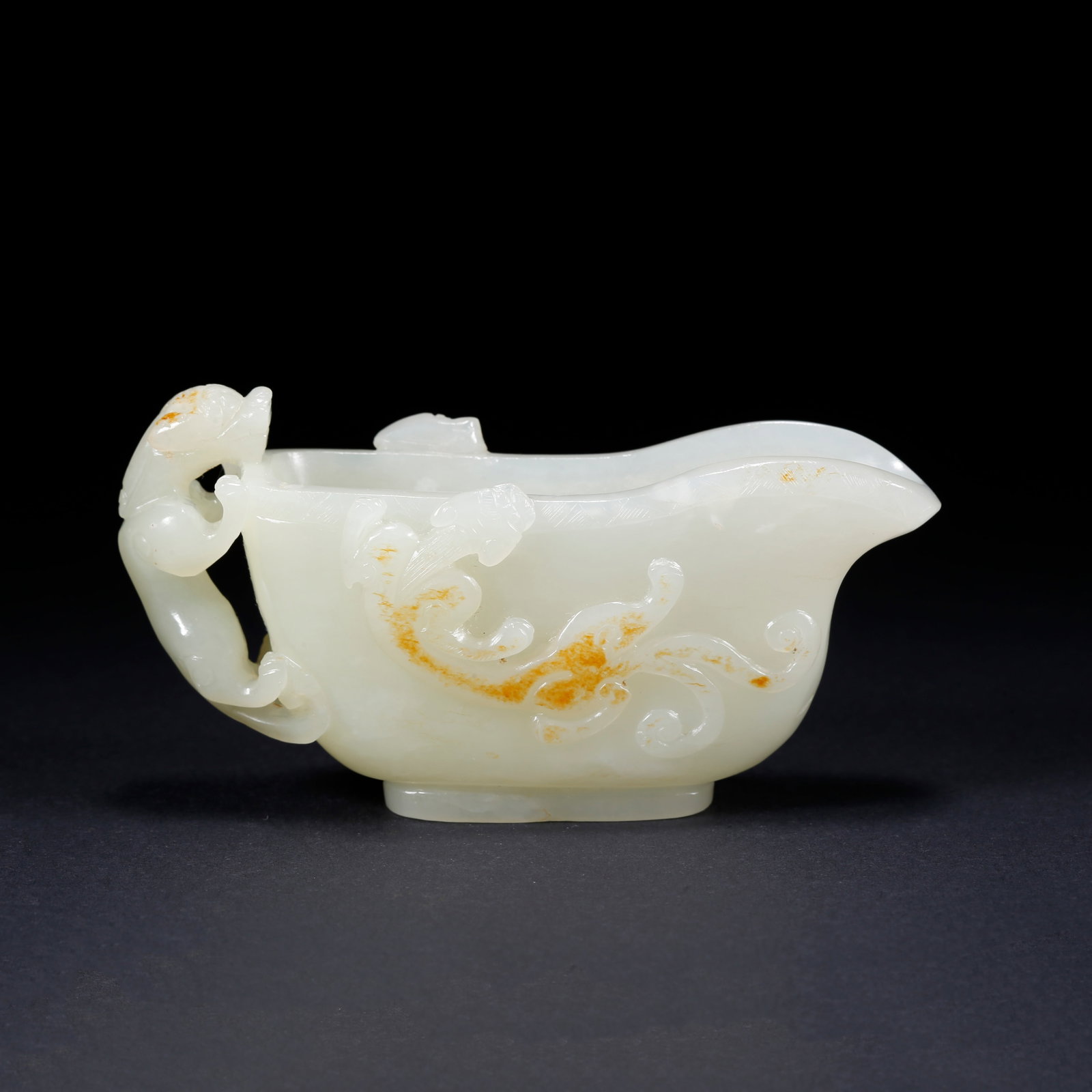 A DRAGON-HANDLED CUP CARVED HETIAN JADE (1 of 10)