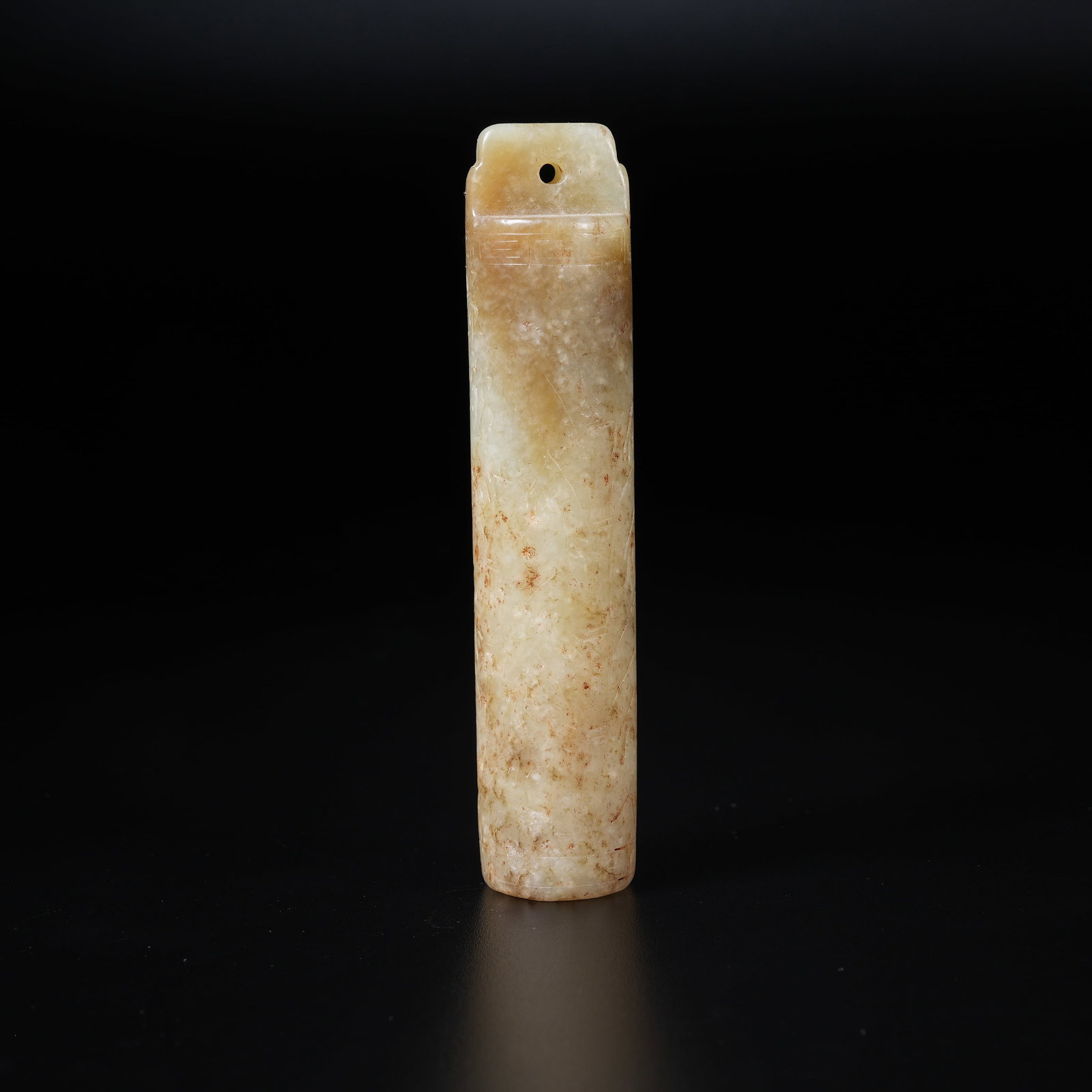 A MEDIEVAL JADE FEATHER TUBE WITH SUBTLY CARVED BAMBOO JOINT PATTERN: Medieval Jade Feather Tube with Subtly Carved Bamboo Joint Pattern