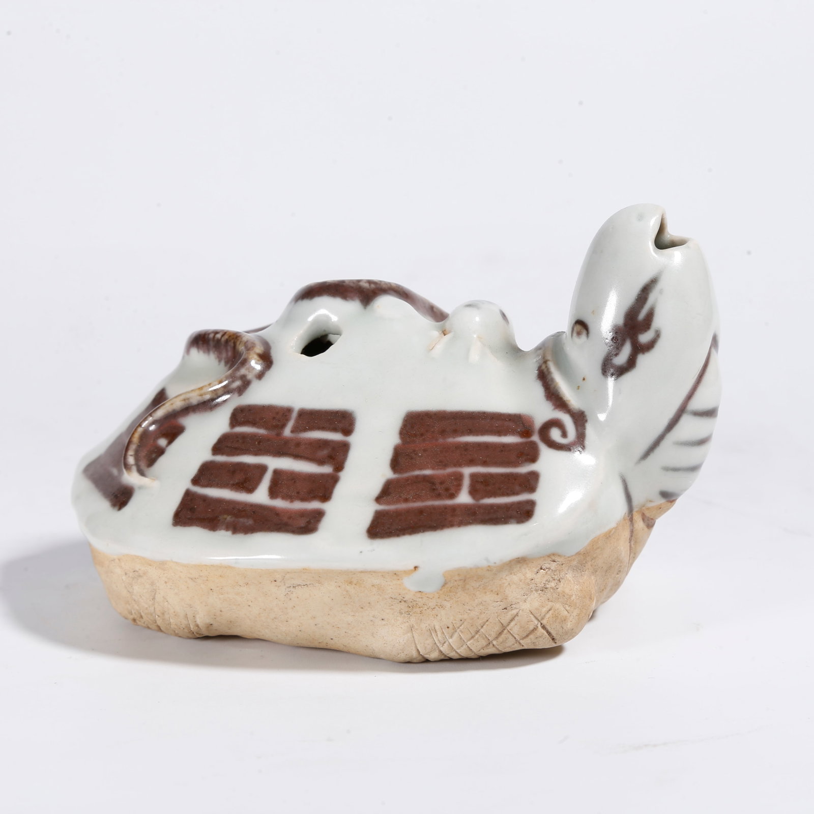A UNDERGLAZE RED TORTOISE-SNAKE-SHAPED WATER DROPPER: Underglaze Red Tortoise-snake-shaped Water Dropper