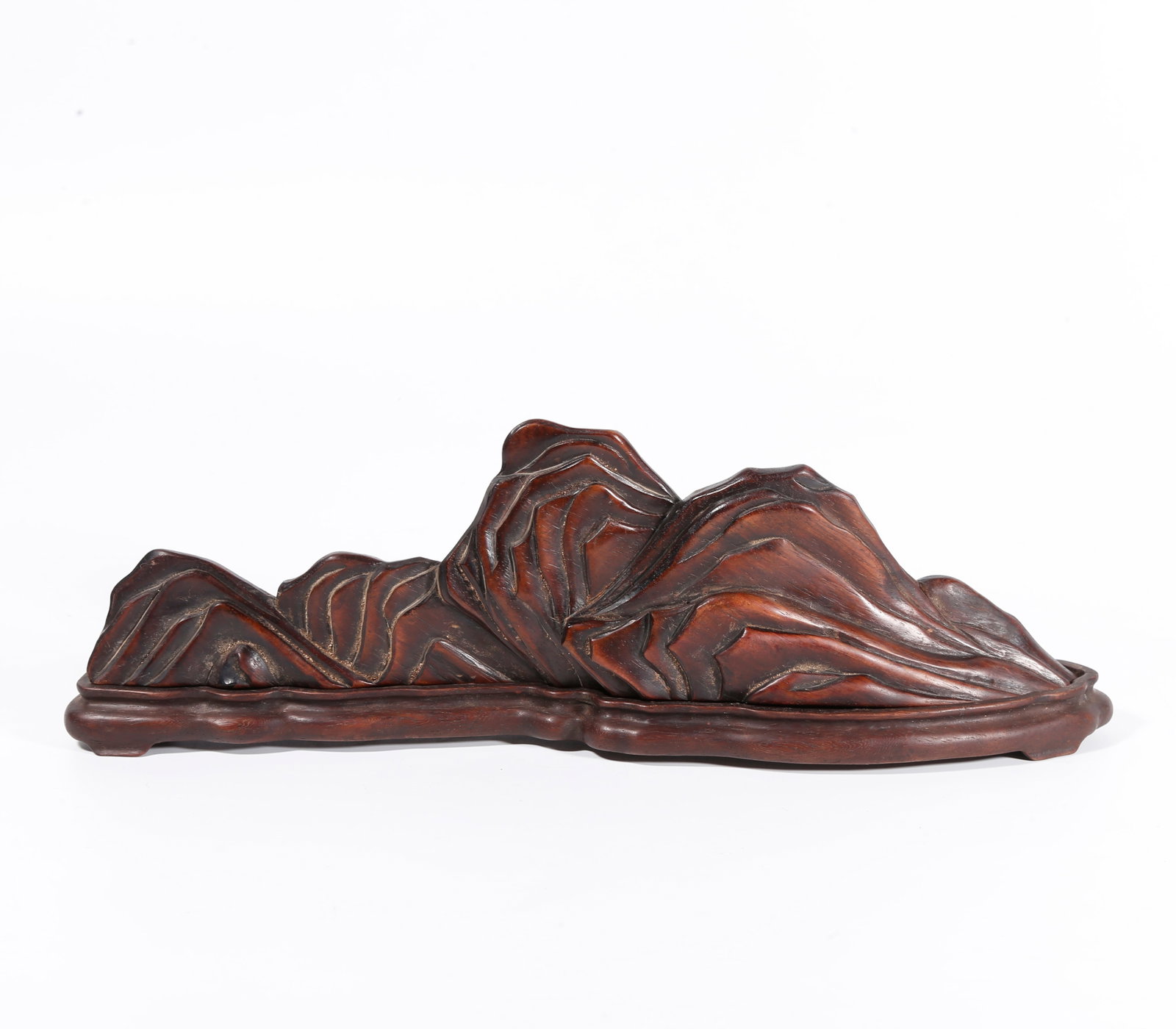 A SCHOLAR'S ROCK ORNAMENT OF HUANGHUALI WOOD: Scholar's rock ornament of huanghuali wood