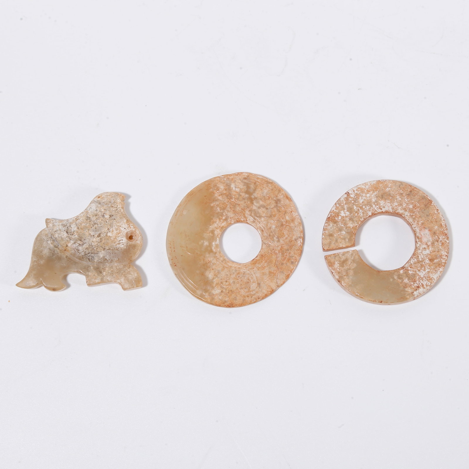 A ARCHAIC JADE PENDANT ORNAMENT (SET): Archaic jade pendant ornament (set)