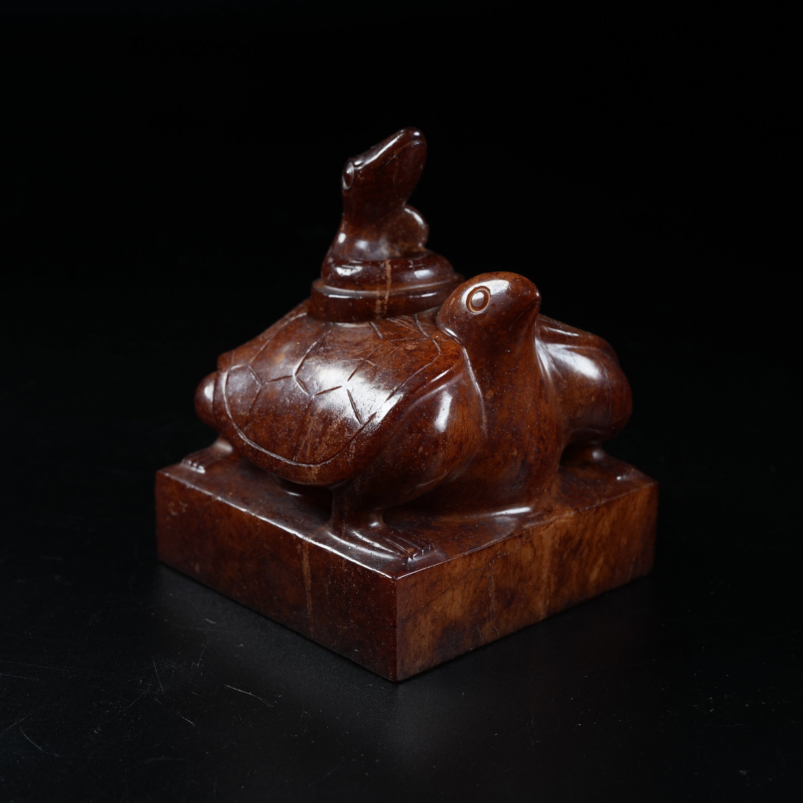 A NESTED ANCIENT JADE SEALS WITH TORTOISE AND SNAKE KNOBS